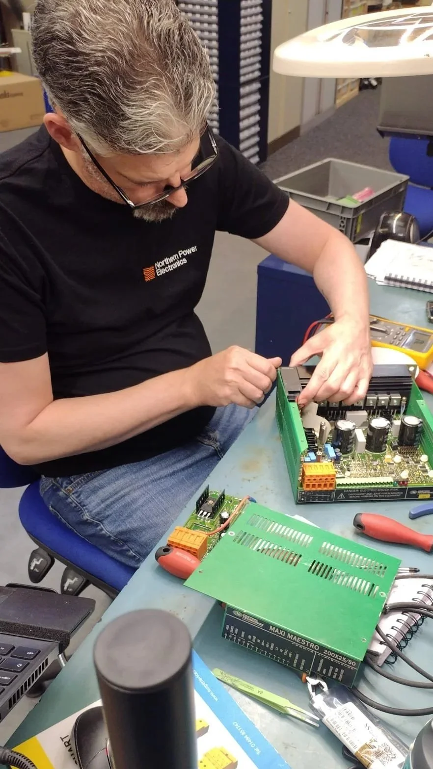 Marine electronics repair — NPE engineer diagnosing drive fault at Newcastle workshop