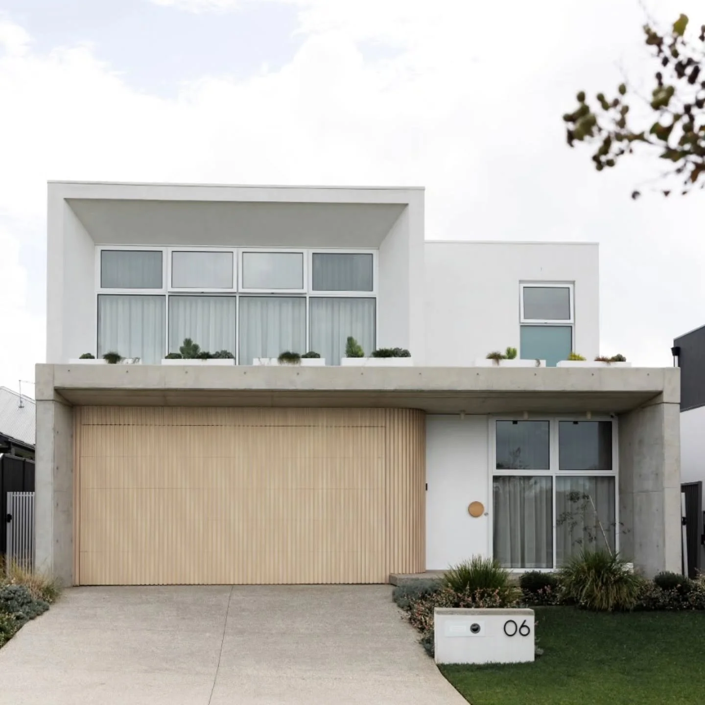 Completed Project: Leslie &ndash; an architecturally designed, bespoke home with refined lines, a muted, layered palette and a clear focus on architecture over decoration.

Exposed off-form concrete, warm timber, honest brickwork and selective greene
