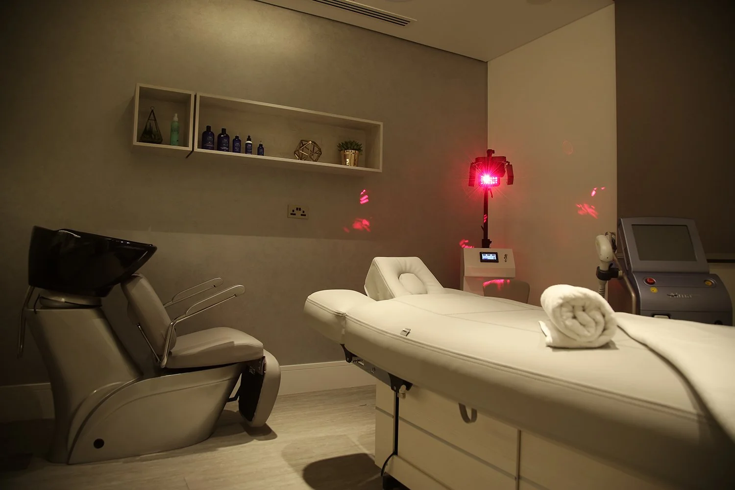 Strategic lighting creates the ideal ambiance throughout the clinic, from the bright reception to the subdued treatment rooms, enhancing both medical functionality and the patient experience.
