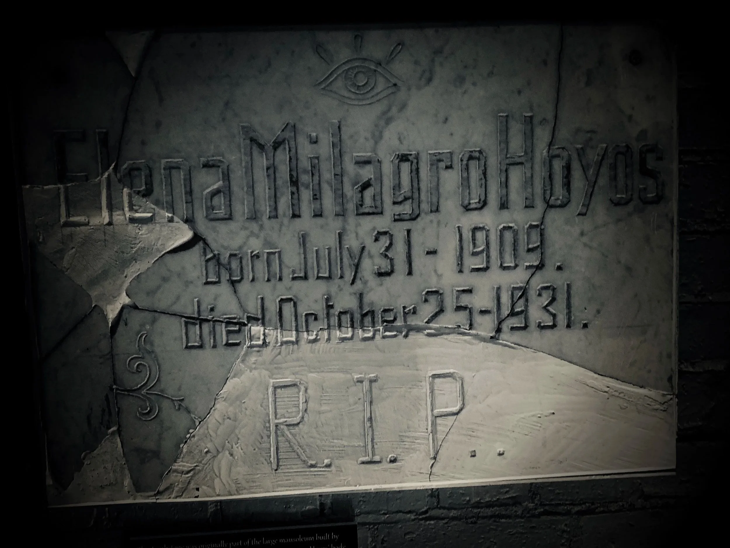 Damaged tombstone of Elena Milagro Hoyos displayed at Fort East Martello Museum in Key West