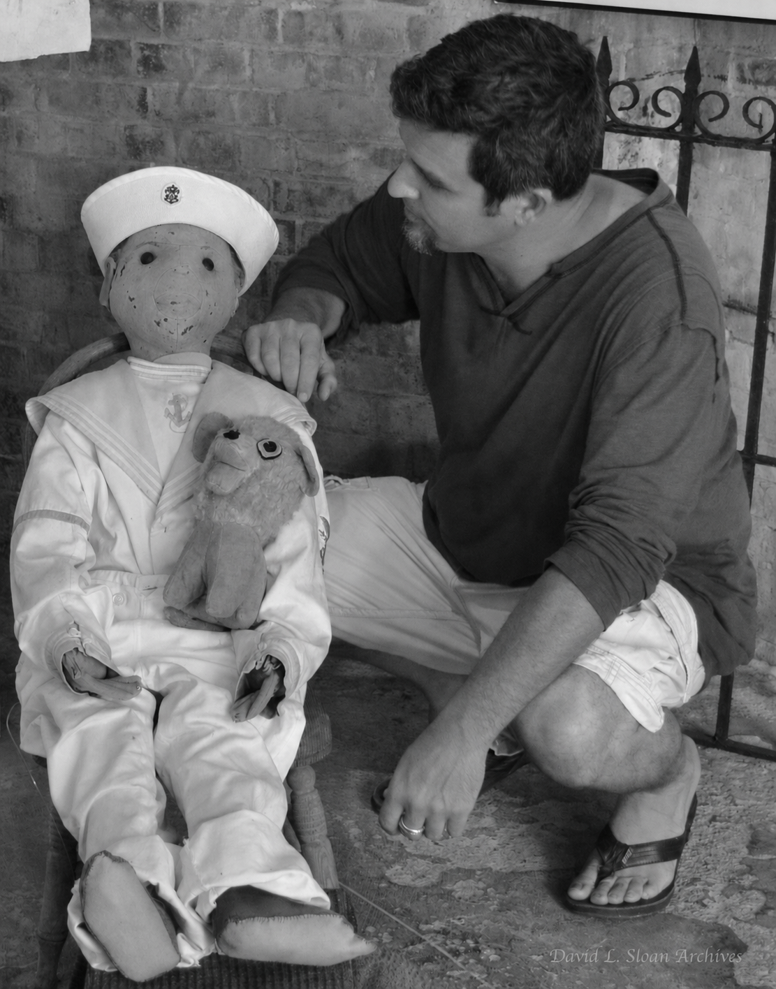 David L. Sloan with Robert the Doll inside Fort East Martello Museum during his early research