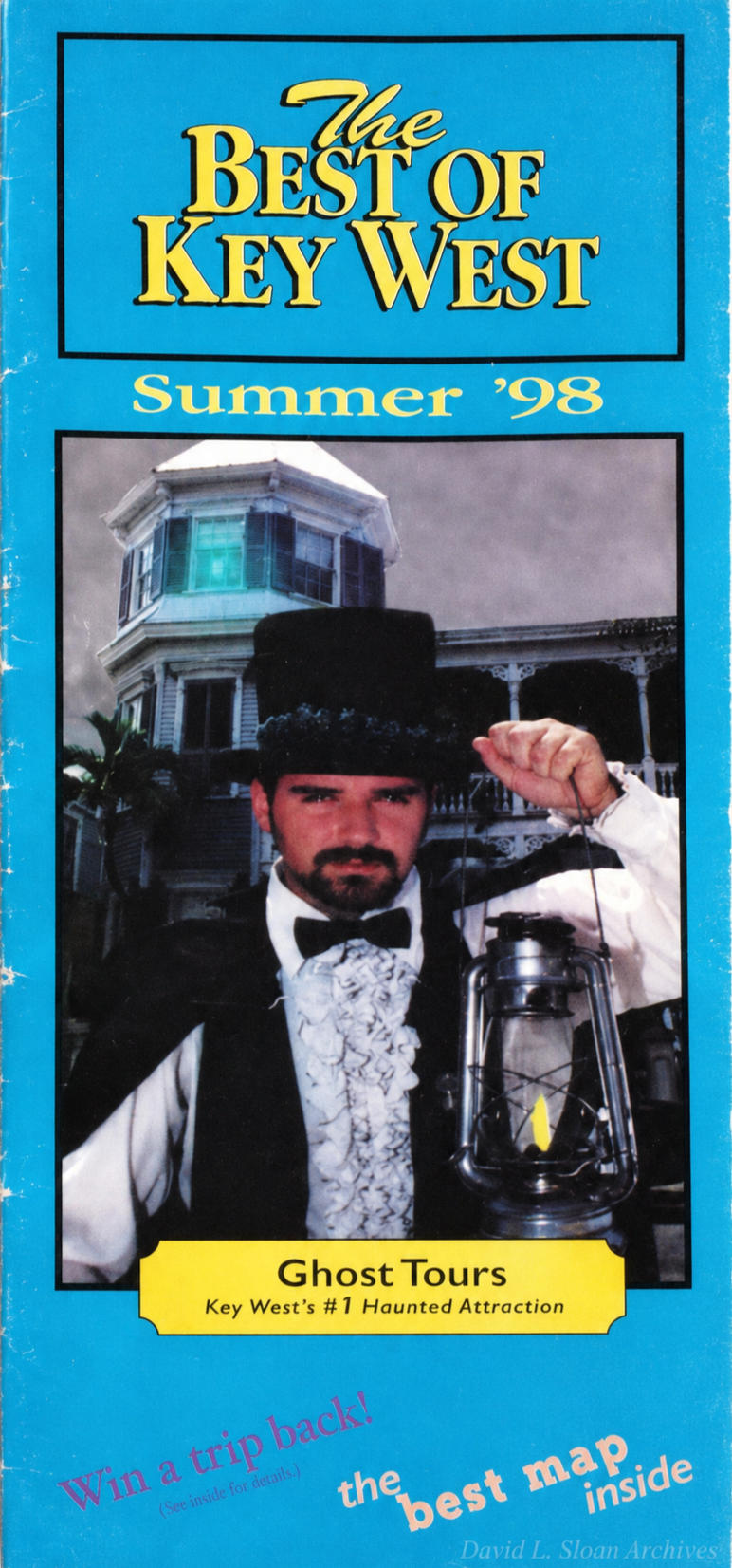 1998 Best of Key West guide featuring David L. Sloan outside Robert the Doll’s former home at 534 Eaton Street