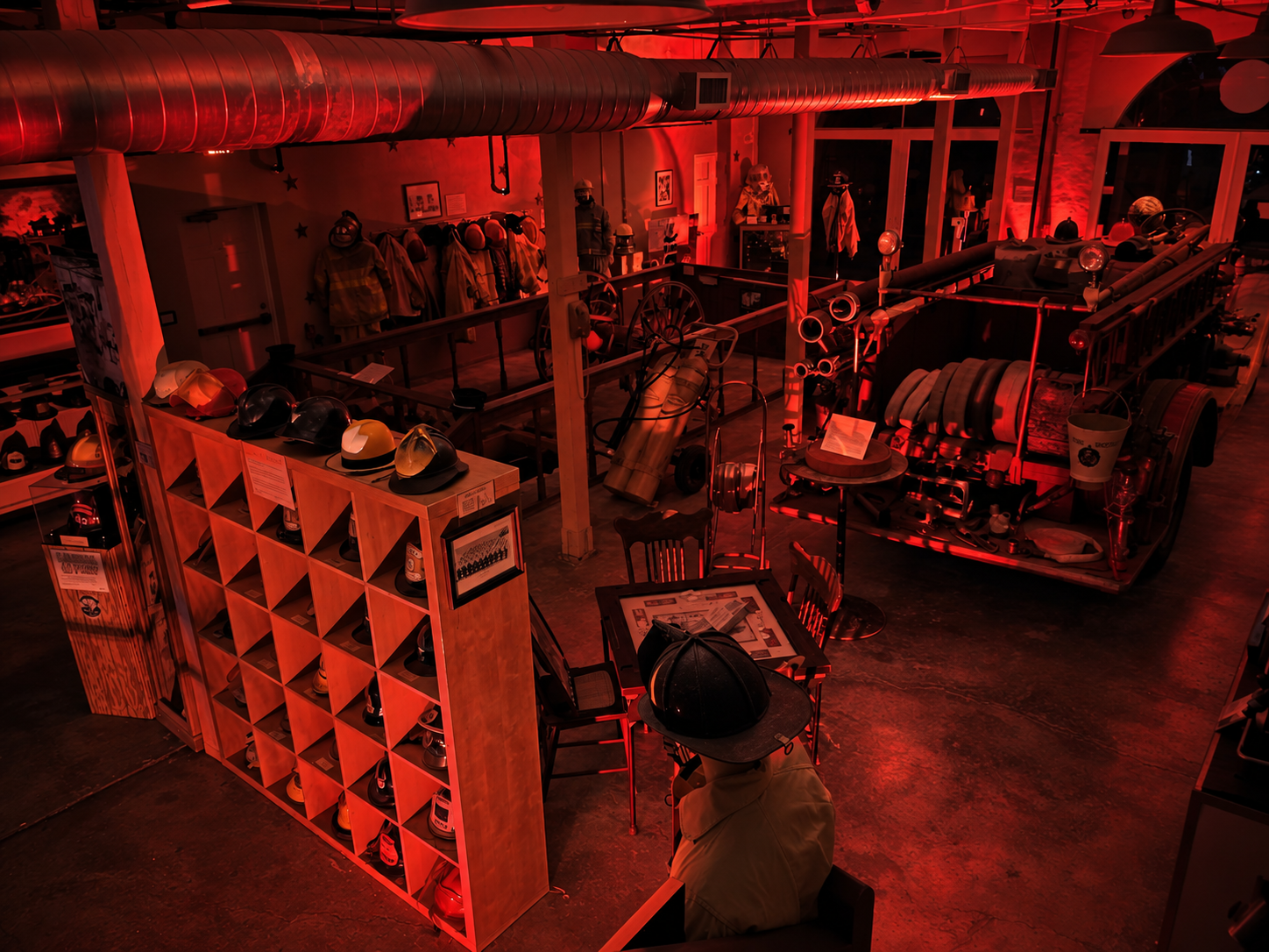 Interior of historic Key West Firehouse No. 3 illuminated in red for an after-hours paranormal investigation