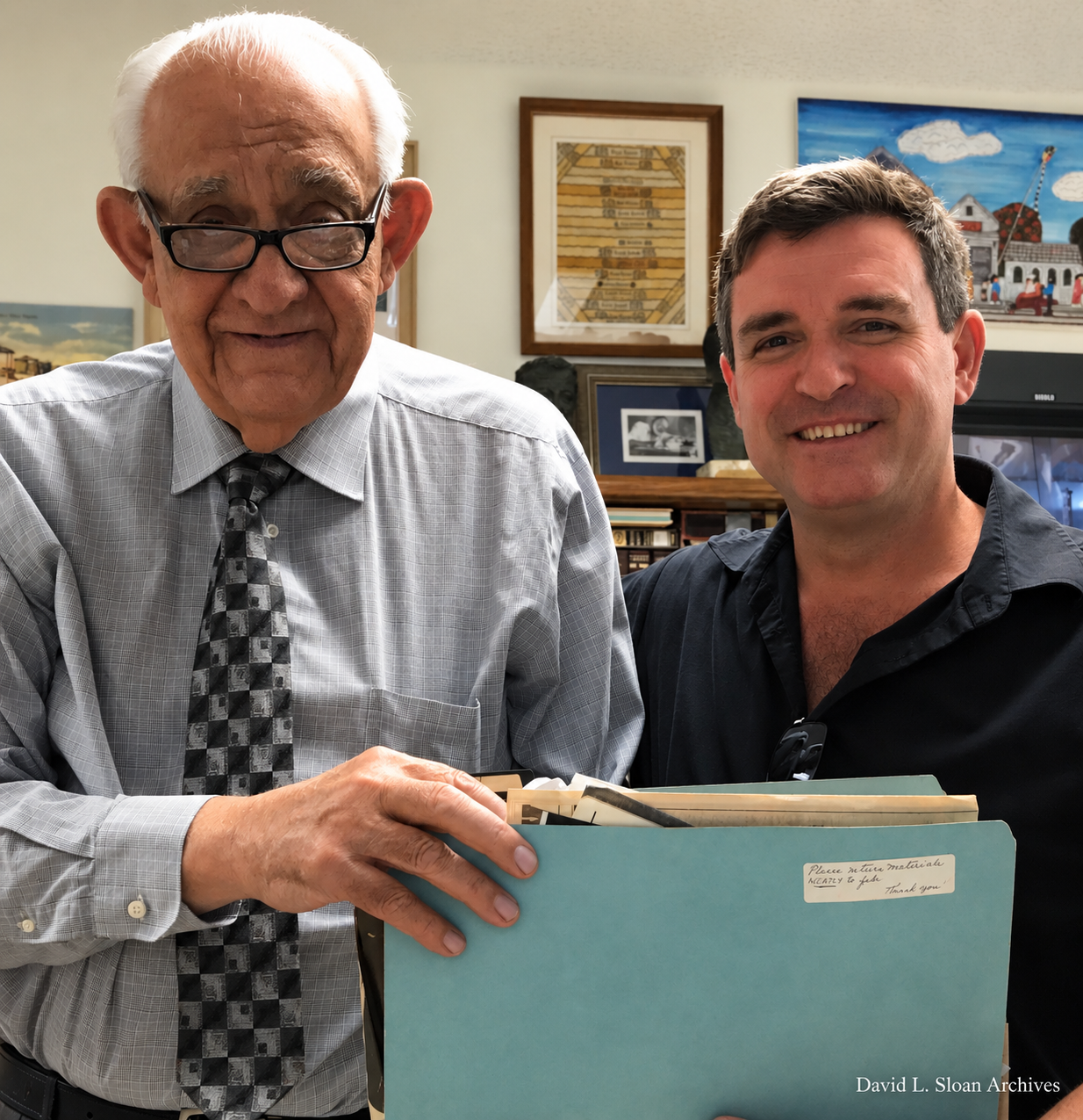 David L. Sloan and Key West historian Tom Hambright with Otto family archival materials