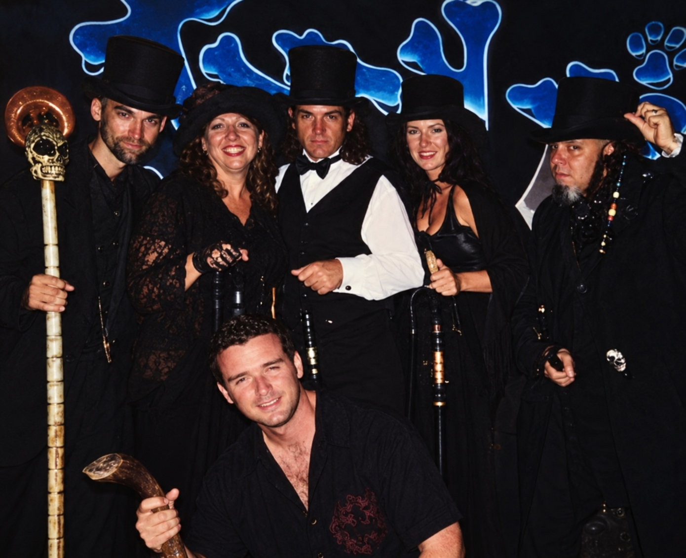 Early Ghost Key West tour crew in black costumes and top hats in Key West