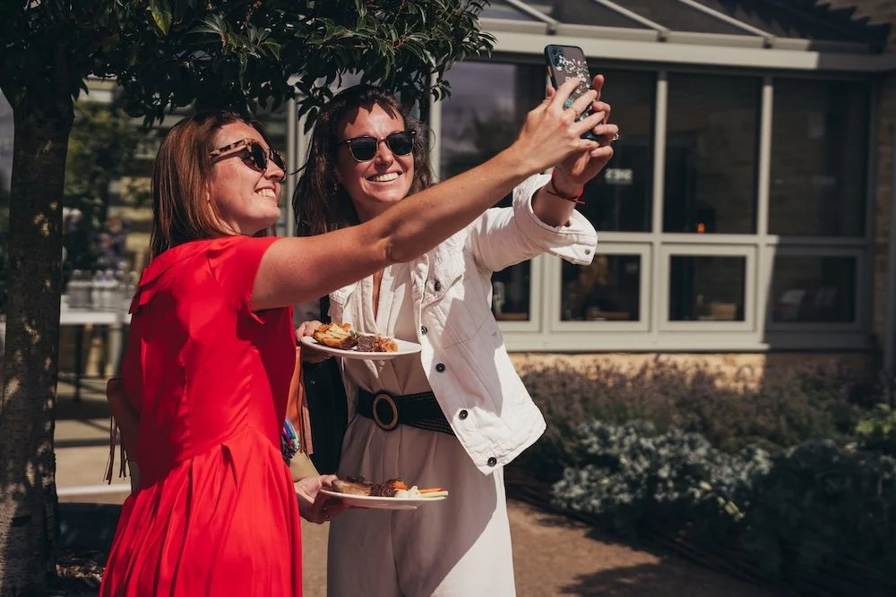She's Electric x Volvo women taking a selfie