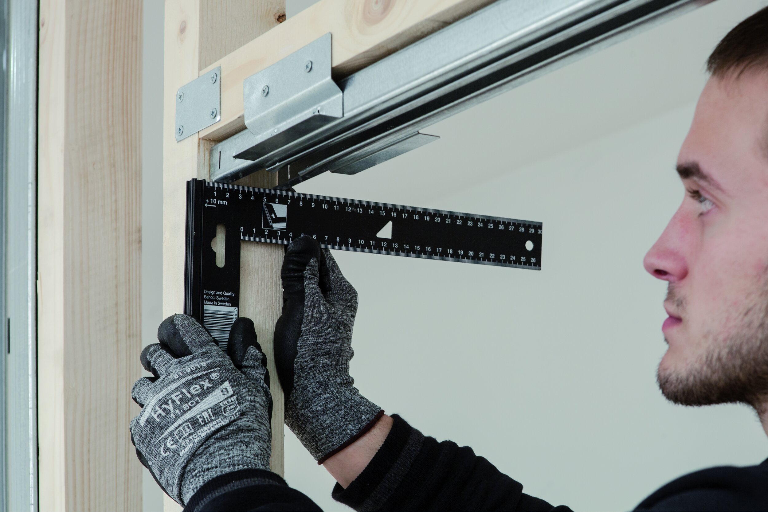 Ensuring the pocket door frame is level with the floor and stud work