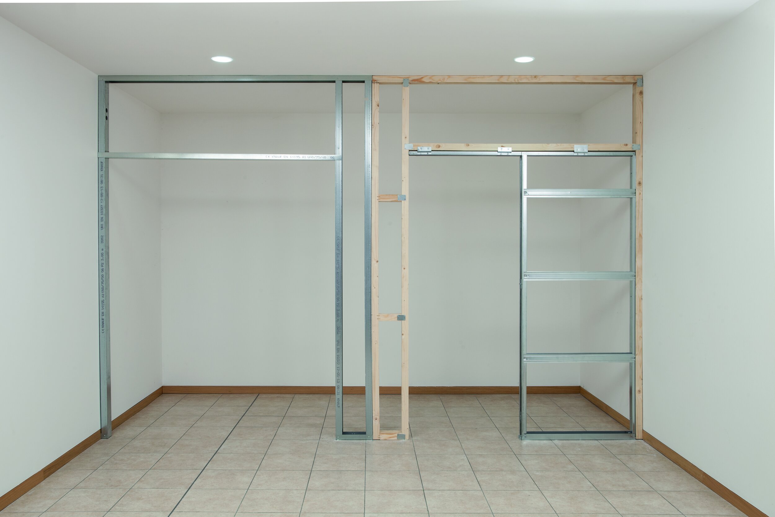 Finished installation of pocket door frame without plasterboard