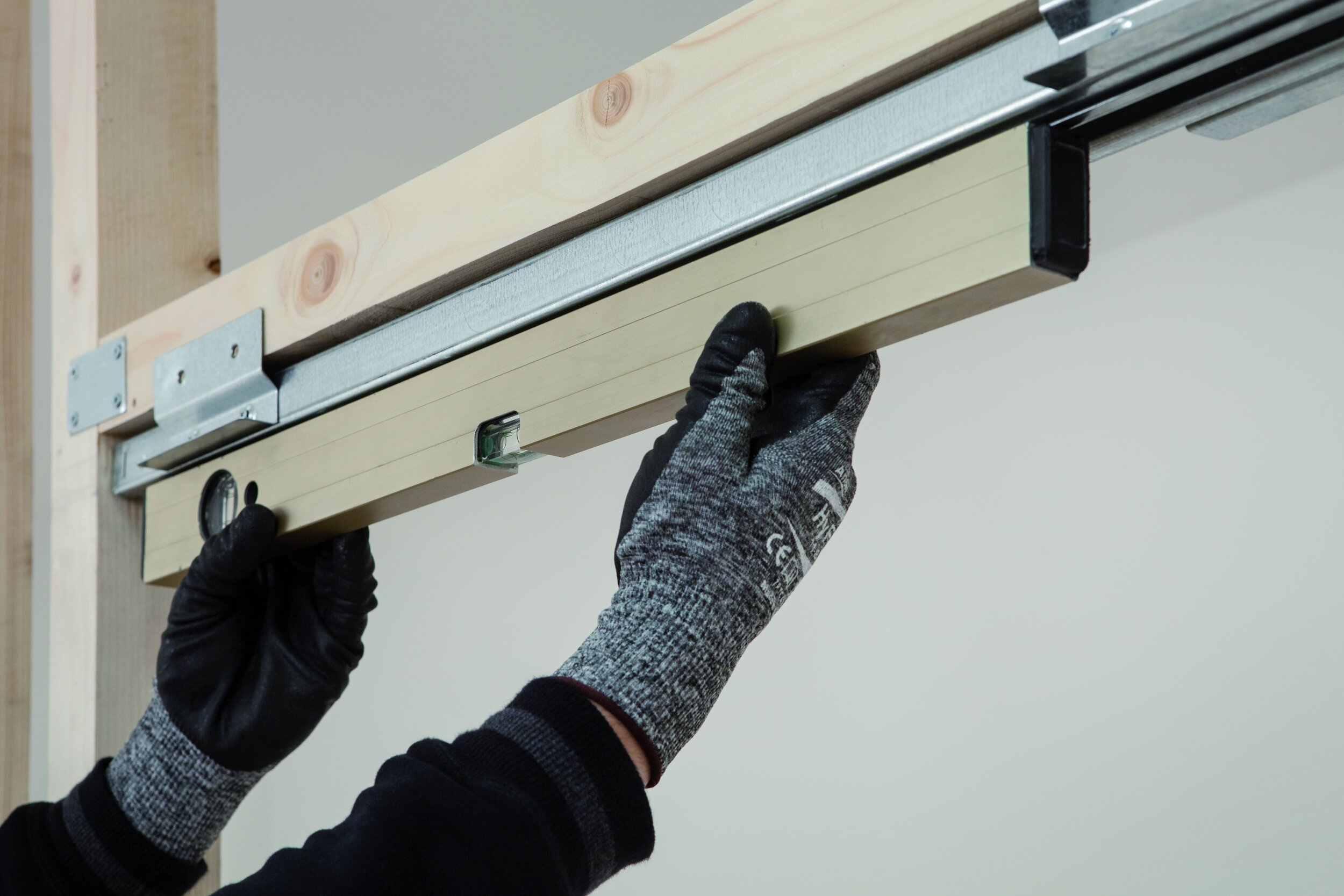 Ensuring the pocket door frame is level with the stud work