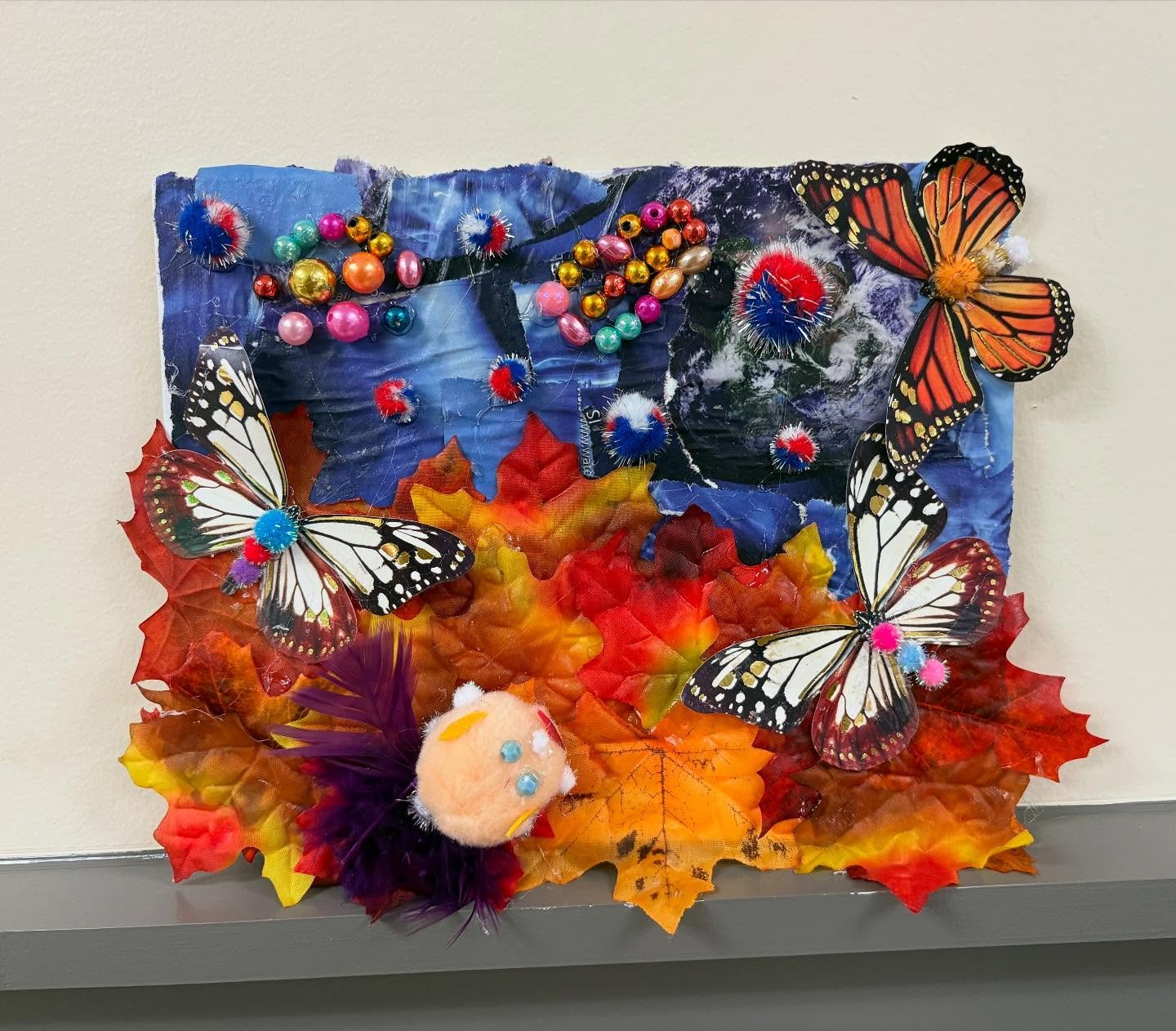 Wicked creative mixed media collages by Kim, Dawn, Pam, Amy E, Steph, and Ed! They used all sorts of materials for these fun creations&mdash; sea glass beads, paper butterflies, tissue paper, magazines, feathers, doll parts, and more. 
.
.
.
.
.
#mix