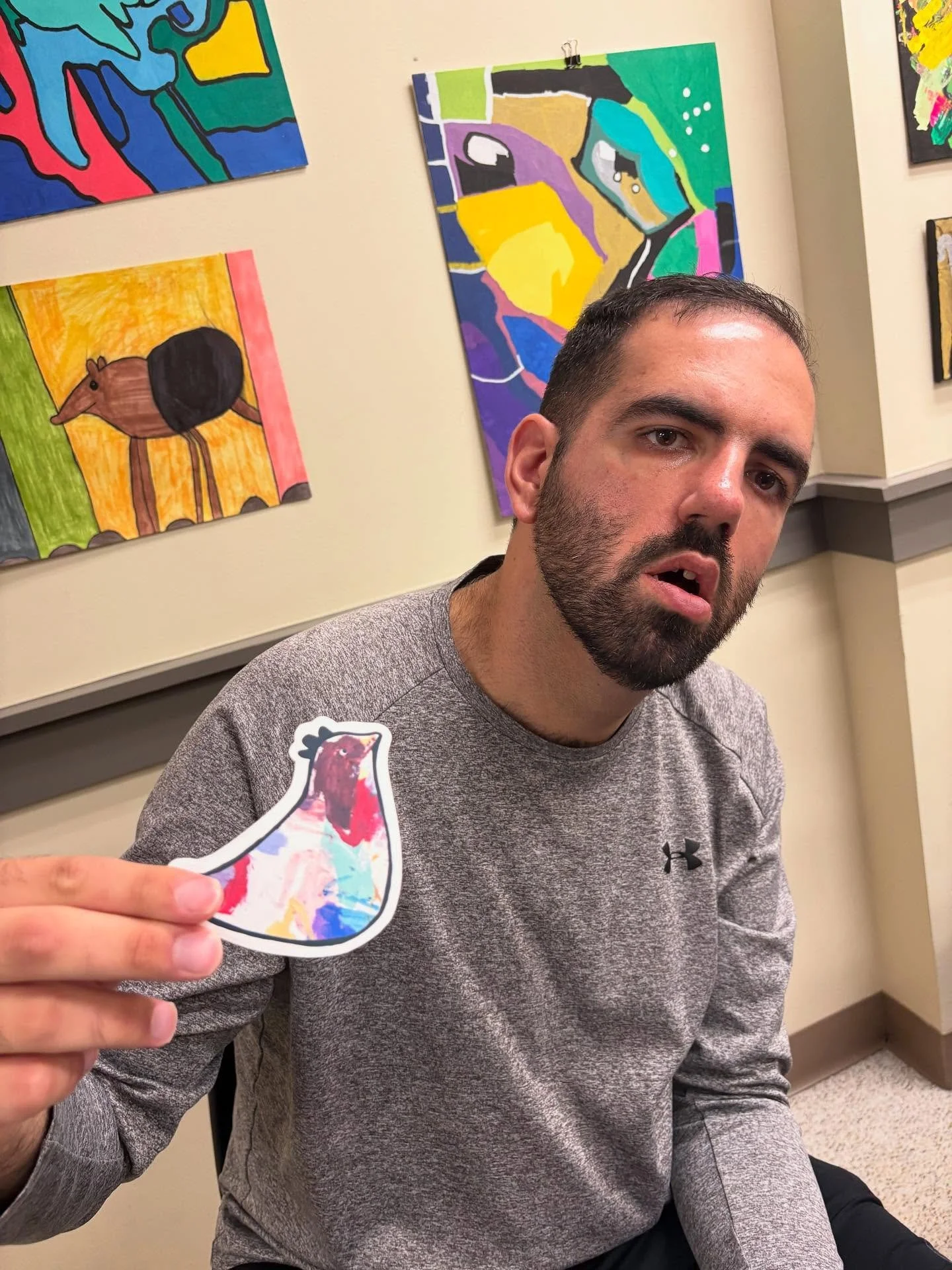 Xan and Eddie designed custom stickers today! And Tyler hung out with visiting studio cat, Moss 🐈&zwj;⬛
.
.
.
#stickers #art #mondays #cat #studiocat