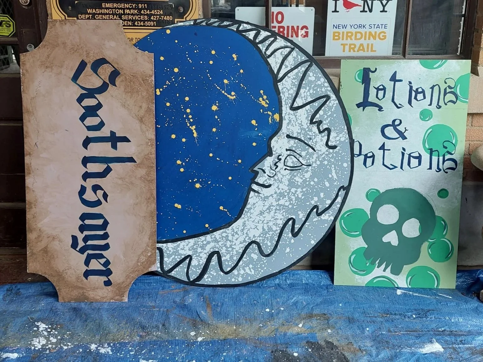 Variety of market signs. Did all lettering, clean lines on the skull/moon, and some of the background painting. Border and white shadow added to "Soothsayer" after this images was taken. 