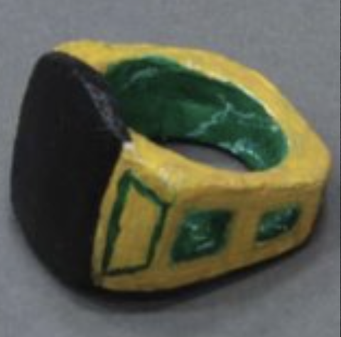 Sanded and painted plastic ring, modeled after Italian Renaissance style buildings.