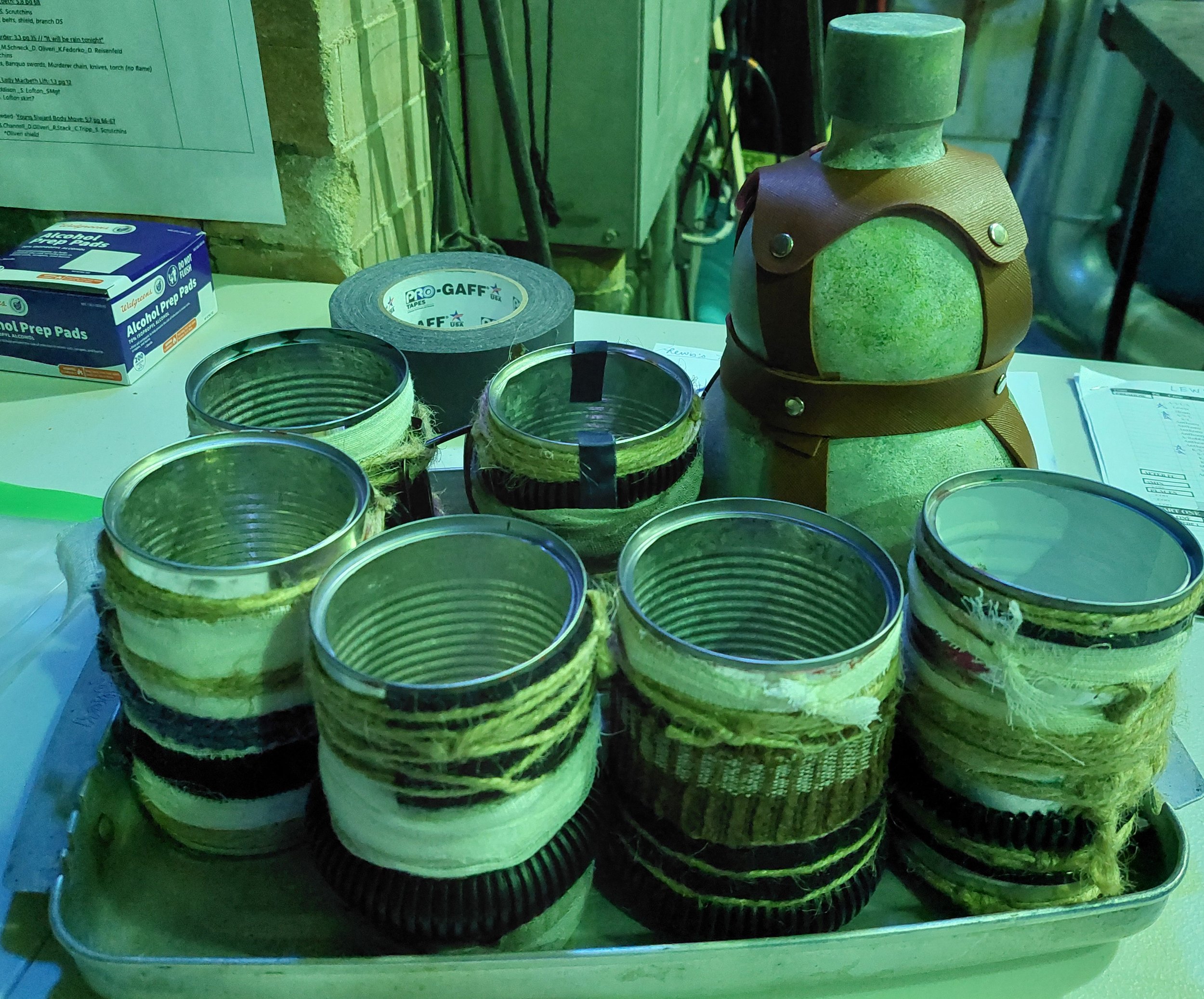 Post-apocalyptic wine cups, made with scrap materials. Bottle and tray made by other members of the team.
