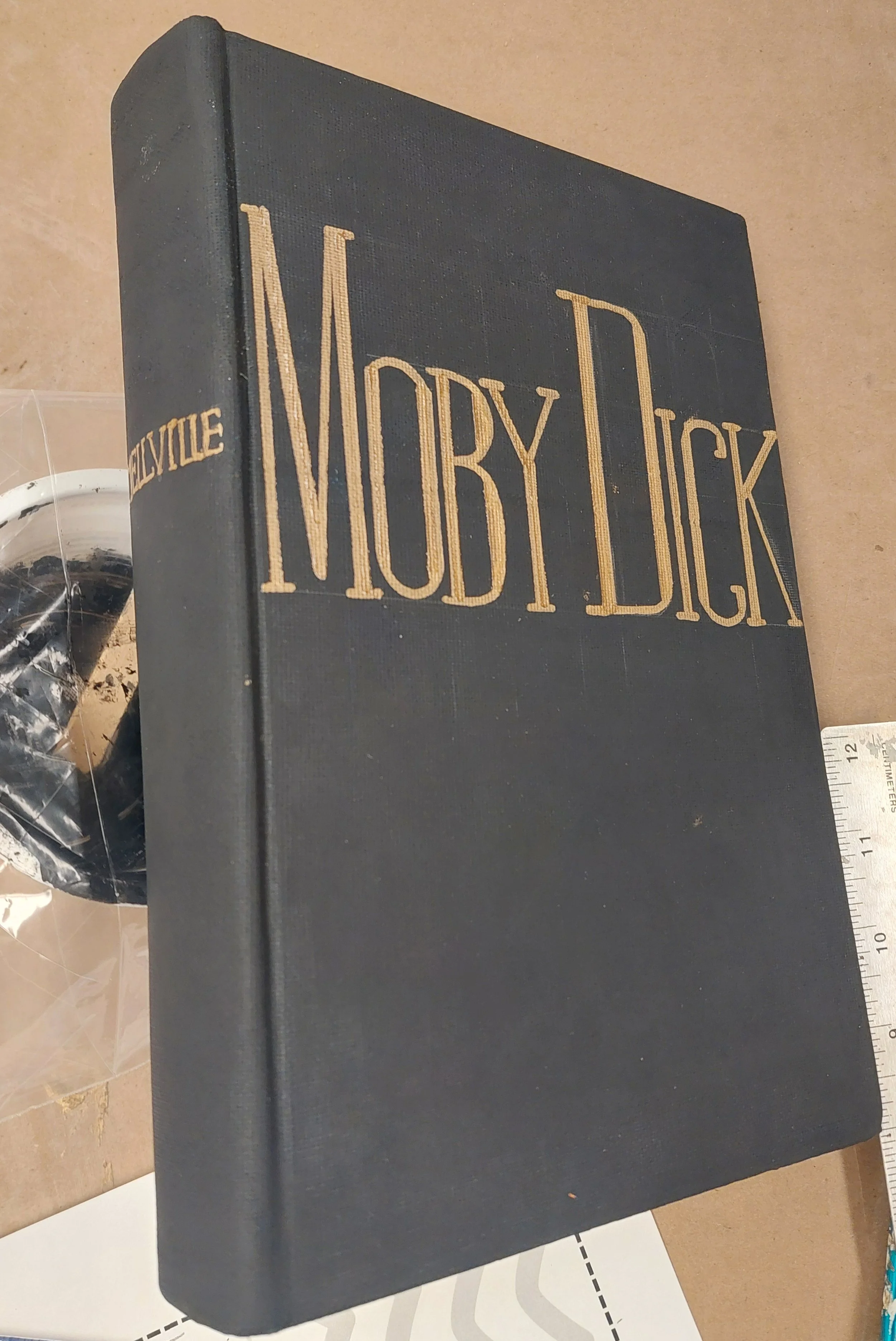 Painted matte black with gesso and started calligraphy using a gold paint pen. Version 1 above was not bold enough to be read, as it is seen for less than 30 seconds. Removed gold and repainted. 