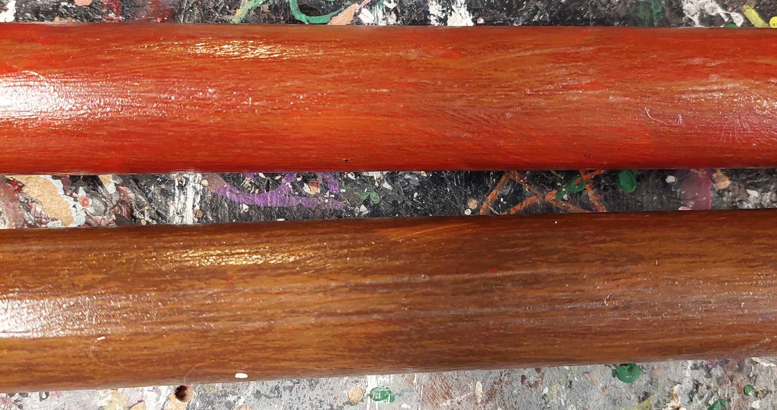 PVC poles painted/sealed to look like wood.
