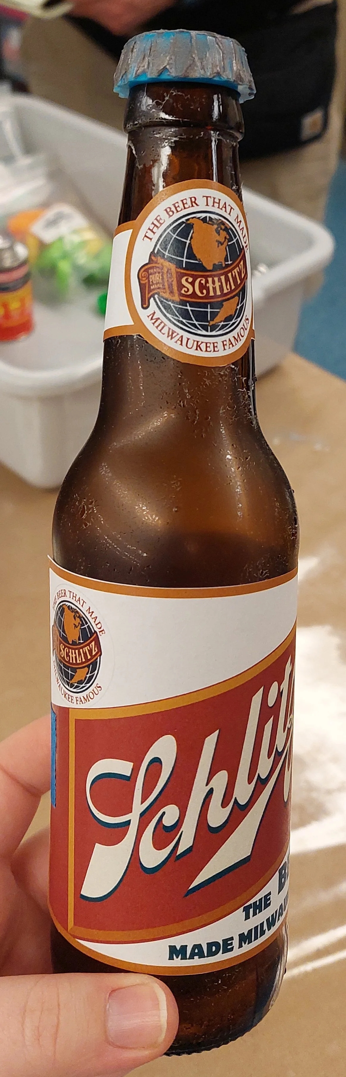 24 bottles of beer on the wall! First mock up. Note the cloudiness of the bottle and the difficulty in painting the silicone cap. Tried contact paper around bottle to protect label, but it looked bad. 