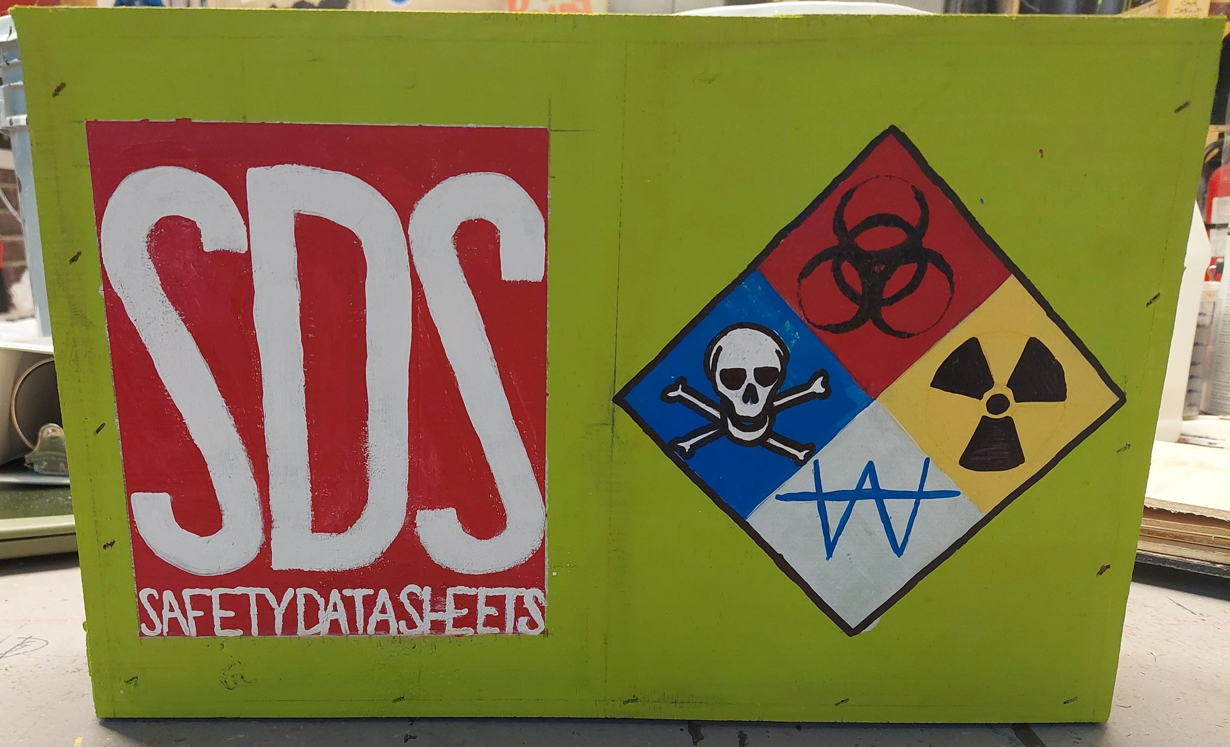 SDS container, hand painted letters and symbols, approximately 3 hours work.
