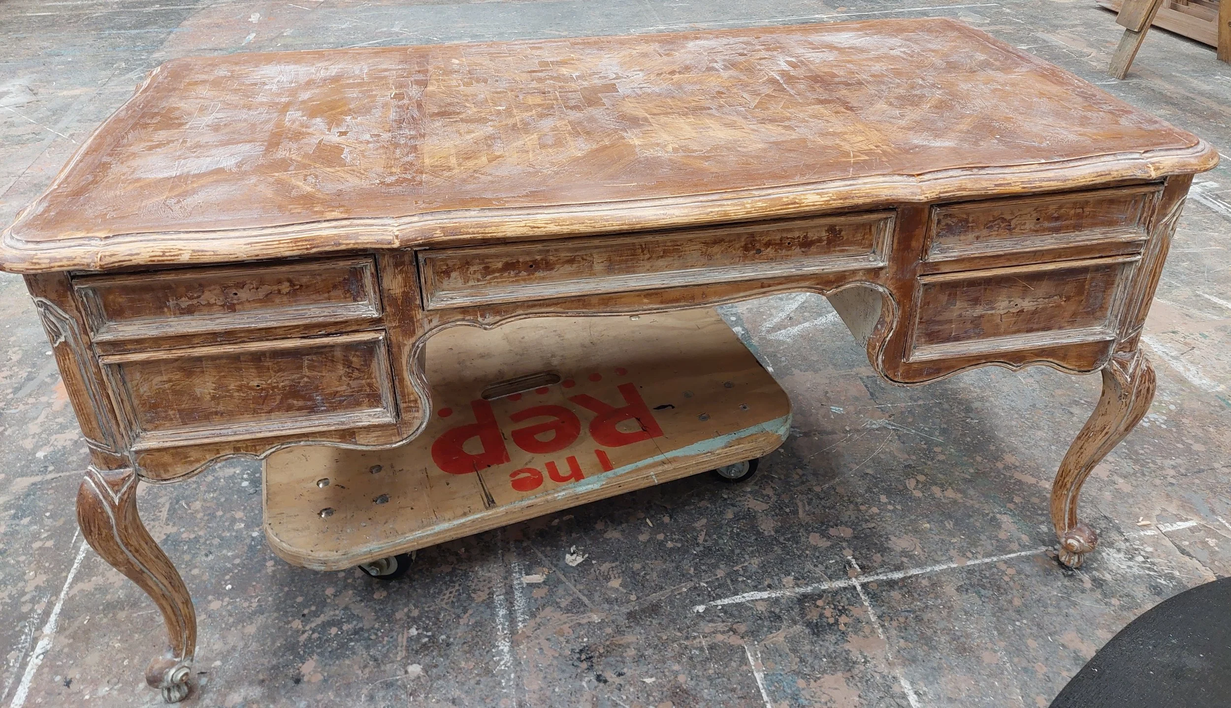 Day 5. The end of the stripping process from the front. Starting the process of gently washing and scrubbing to remove excess paint, stripper, and sticky varnish with warm soapy water and mineral spirit.