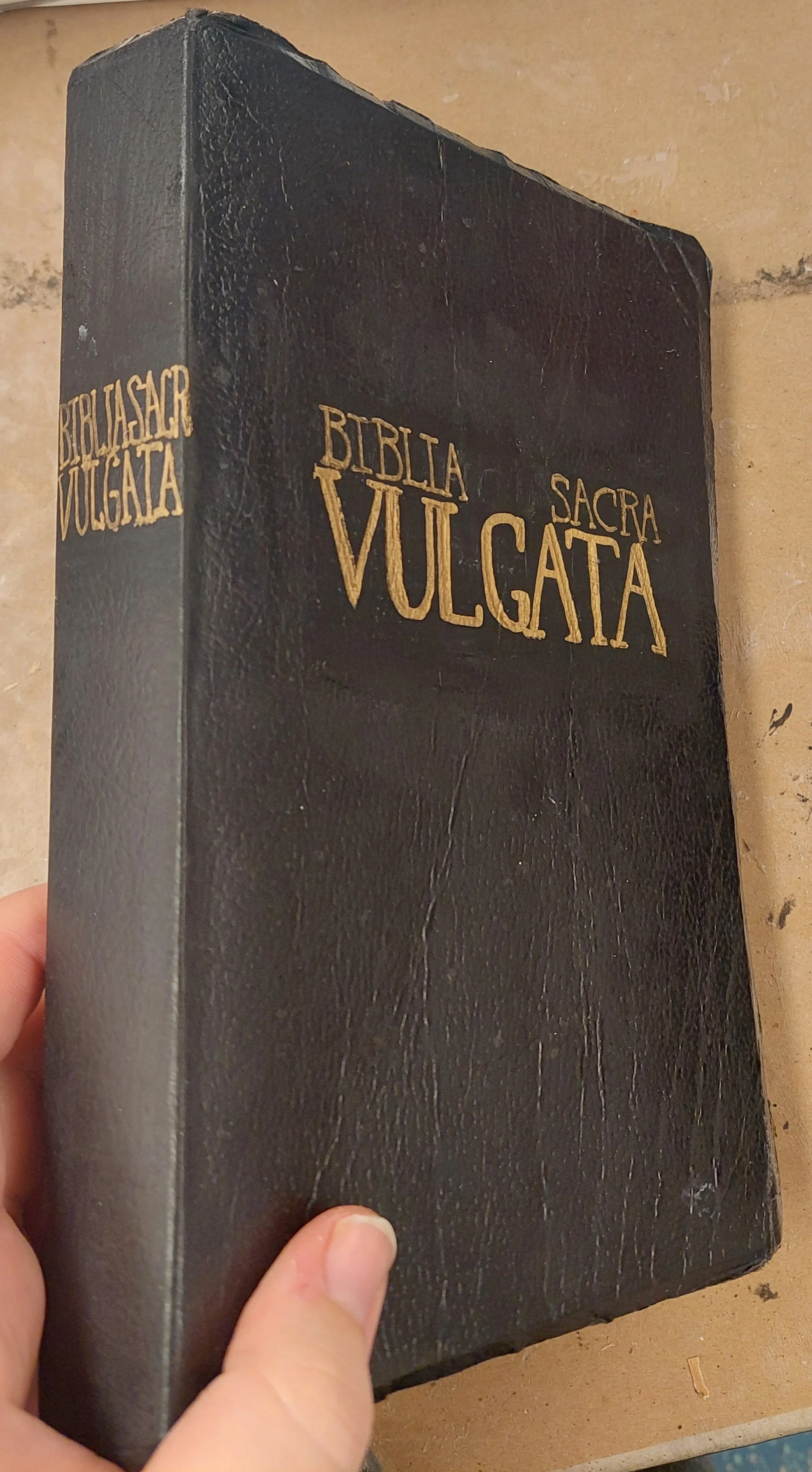 Large bible with spine. Freehanded the letters after taping out the space, since the leather covers can't be easily sketched on. 