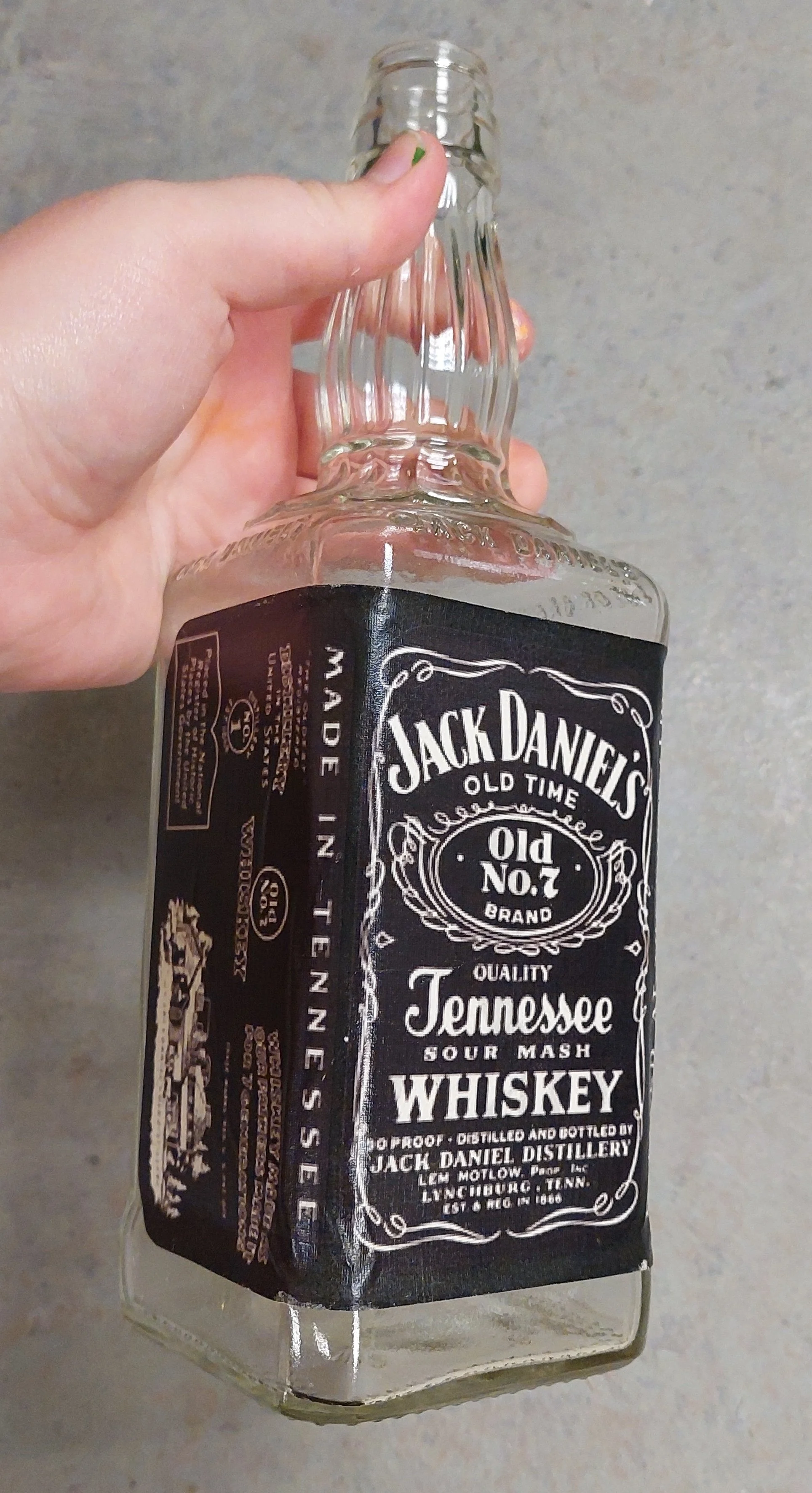 Whiskey label application, across a modern bottle. Some were printed on regular paper and glued, like this one, and some were printed on the sticker paper. Ended up with 4 bottles.
