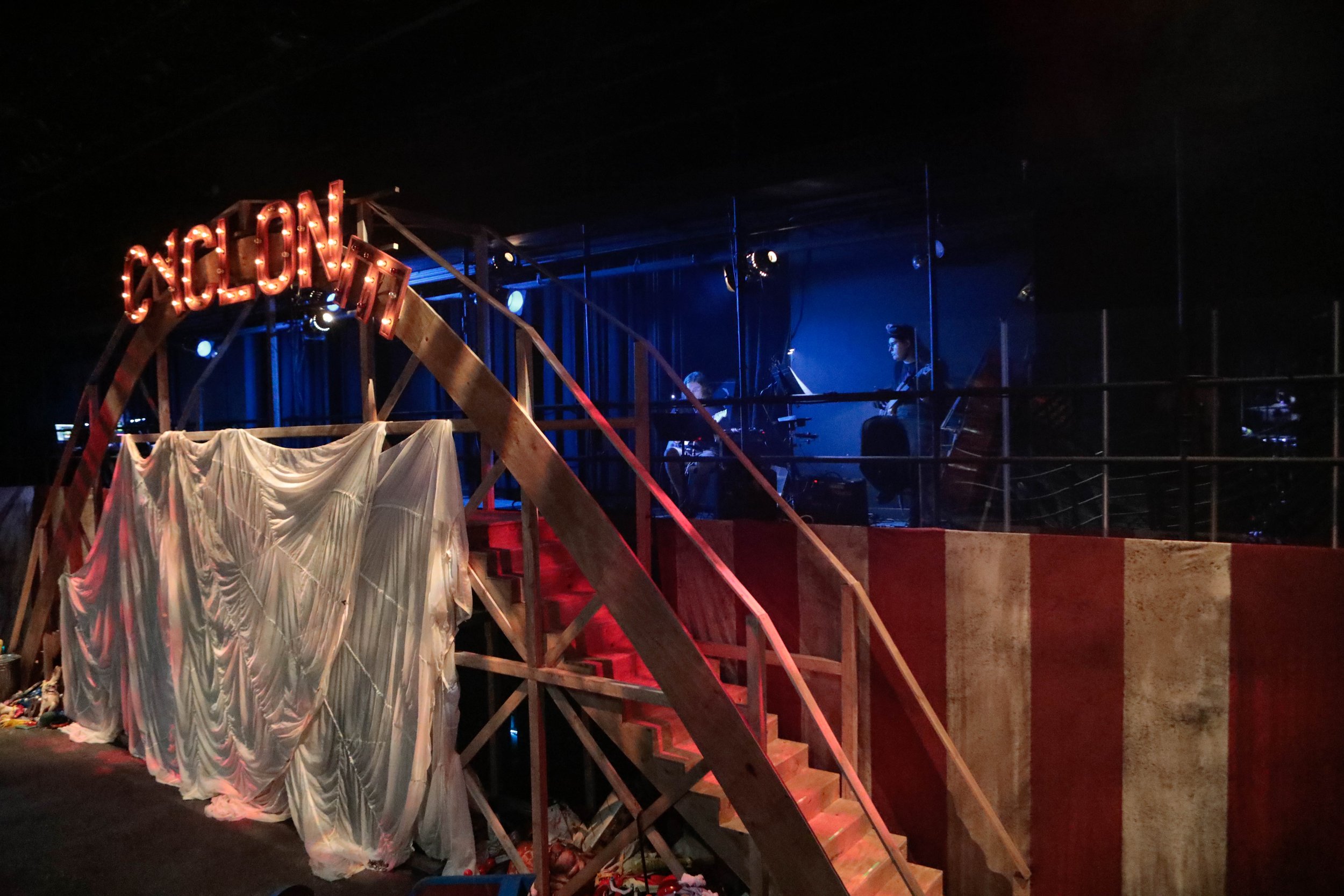 Full set, specifically the rollercoaster track and weathered, circus backdrop.
