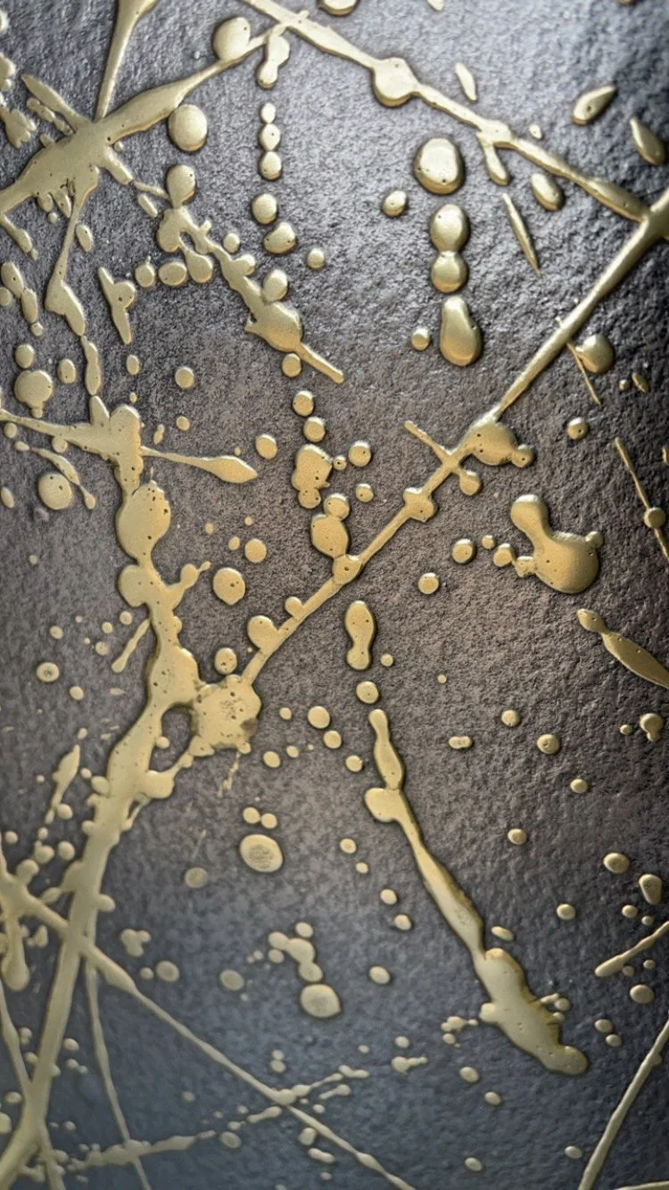 Metal on wood work sample.