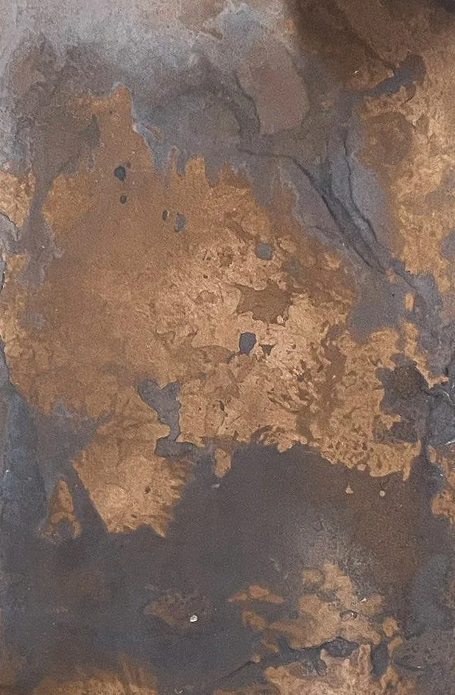 Metal on wood work sample.