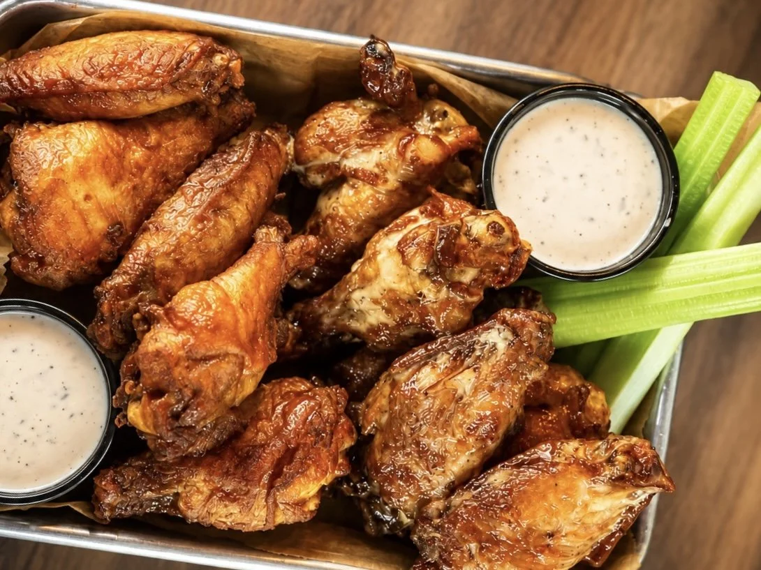 jumbo wings with celery, ranch, and bleu cheese dipping sauce
