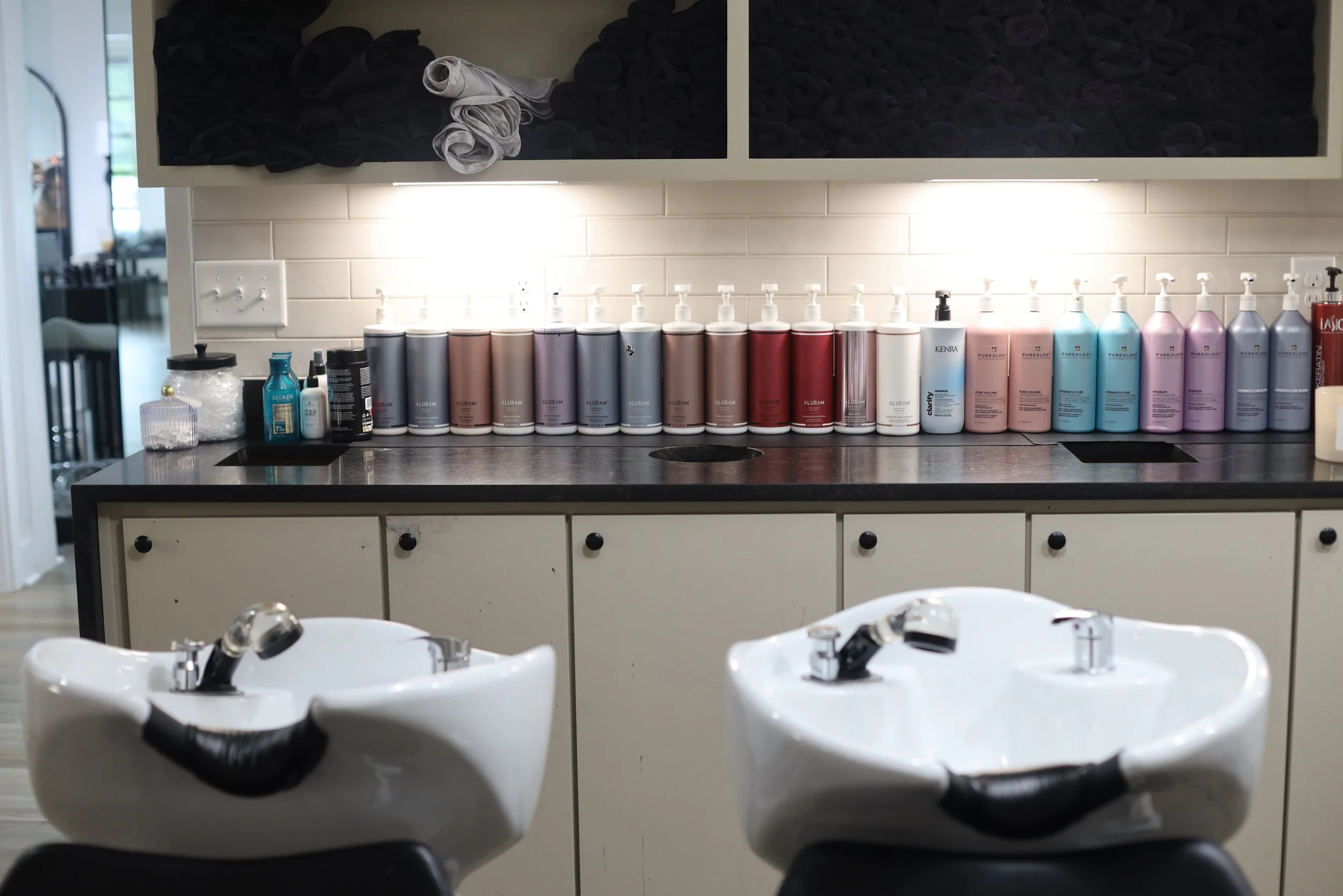 knockout chairs and sinks in a salon or barbershop.