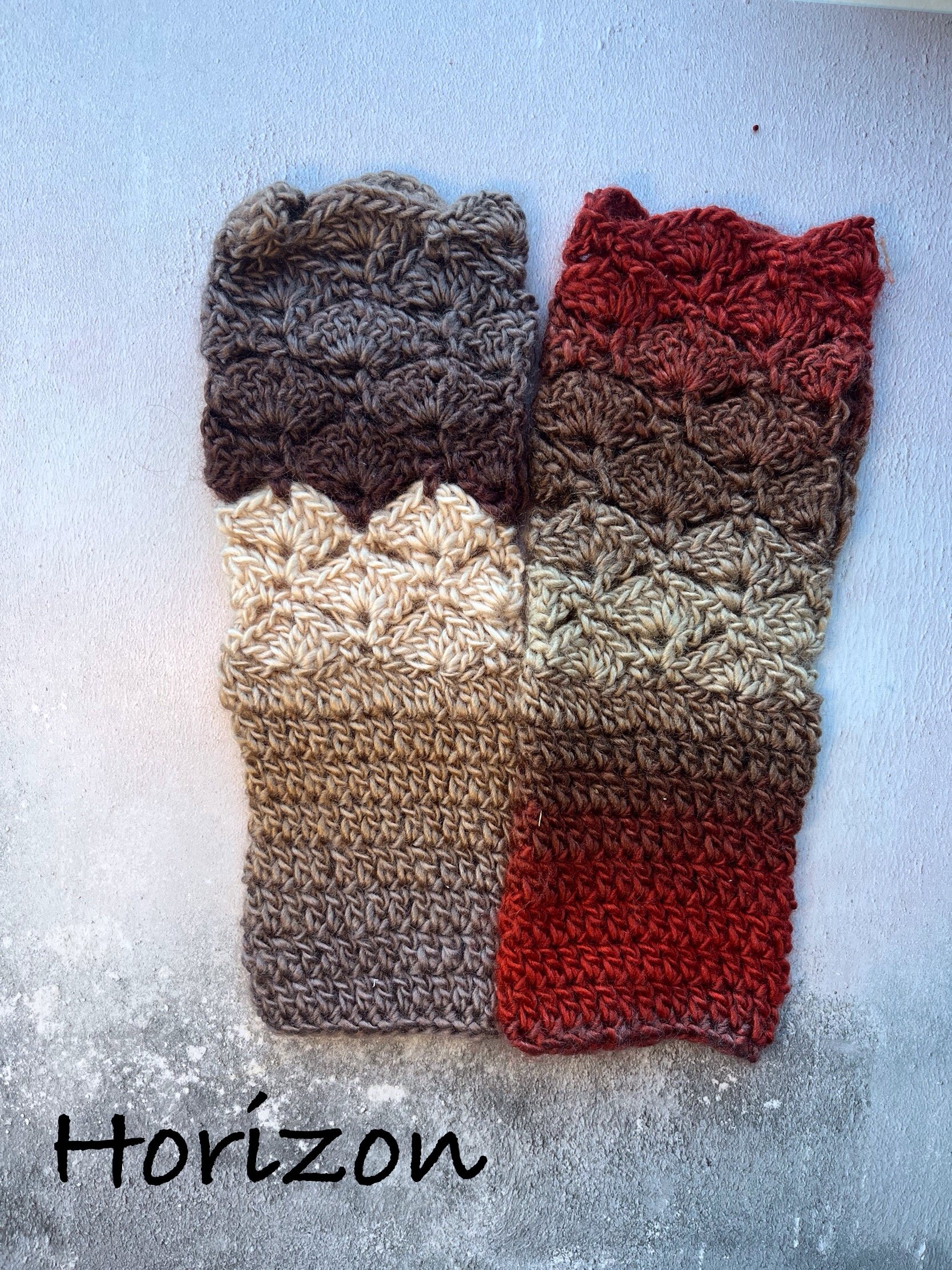 Crochet fingerless gloves in warm colours of brown and grey. Made with acrylic yarn in a subtle colour transition