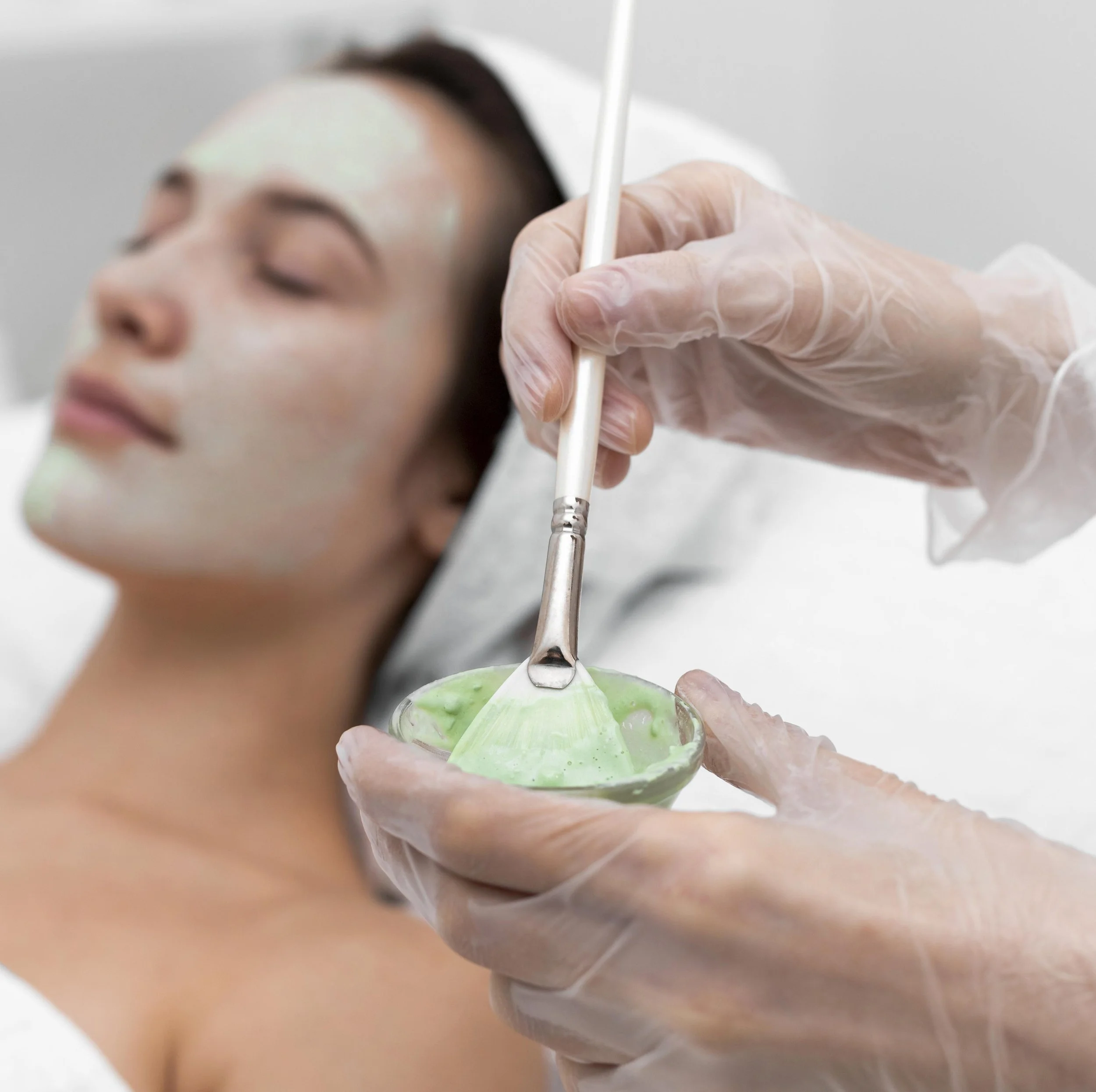 client getting face mask, enzyme treatment, dmk enzyme therapy near me