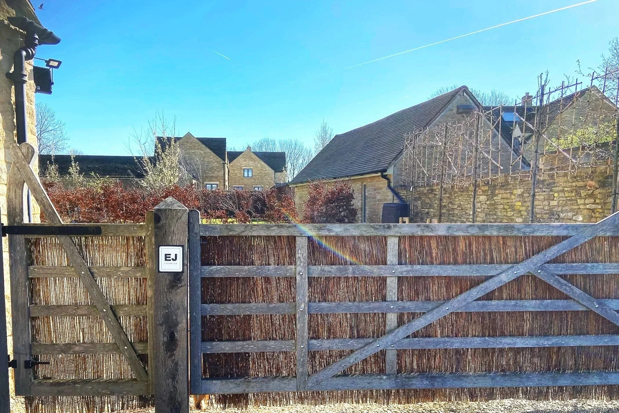 Gate with E J Framing sign