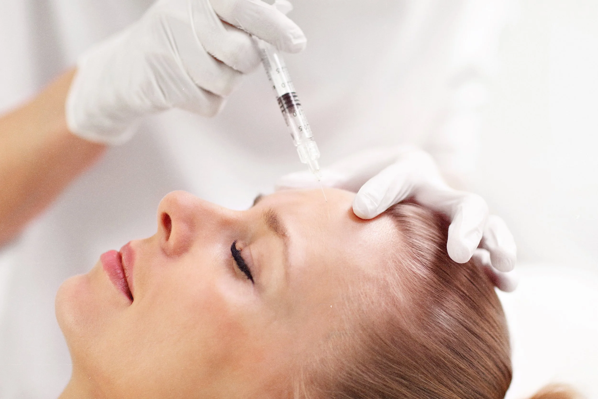 Smooth forehead lines with expert Botox treatment at Birmingham clinic.