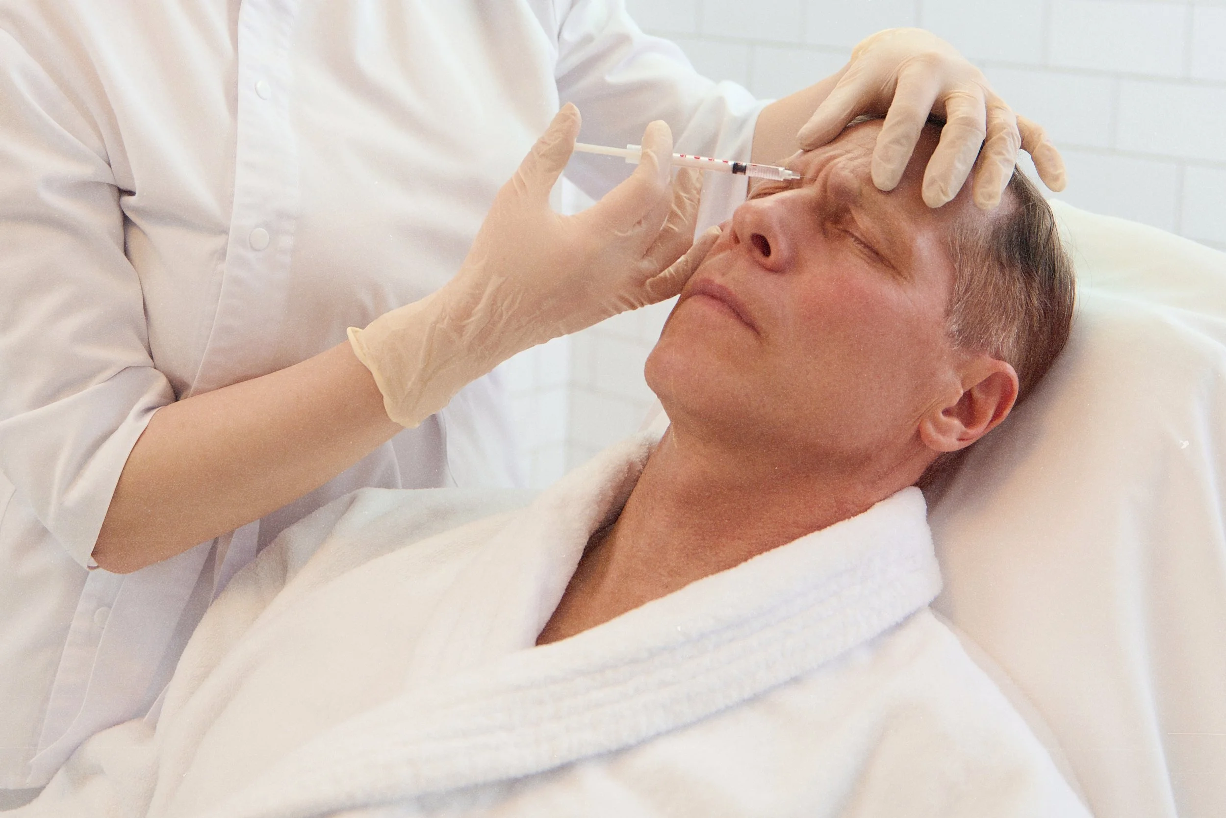 Effective Botox for frown lines in professional Birmingham aesthetics center.