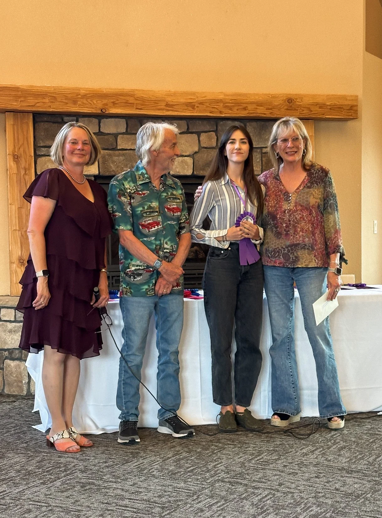 Julia Robinson, plein air artist accepting two awards at peak art adventure