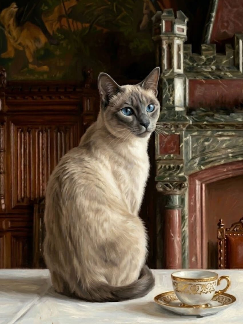 A Siamese cat with blue eyes sitting on a table next to a ornate teacup and saucer in a luxurious, vintage-style room.