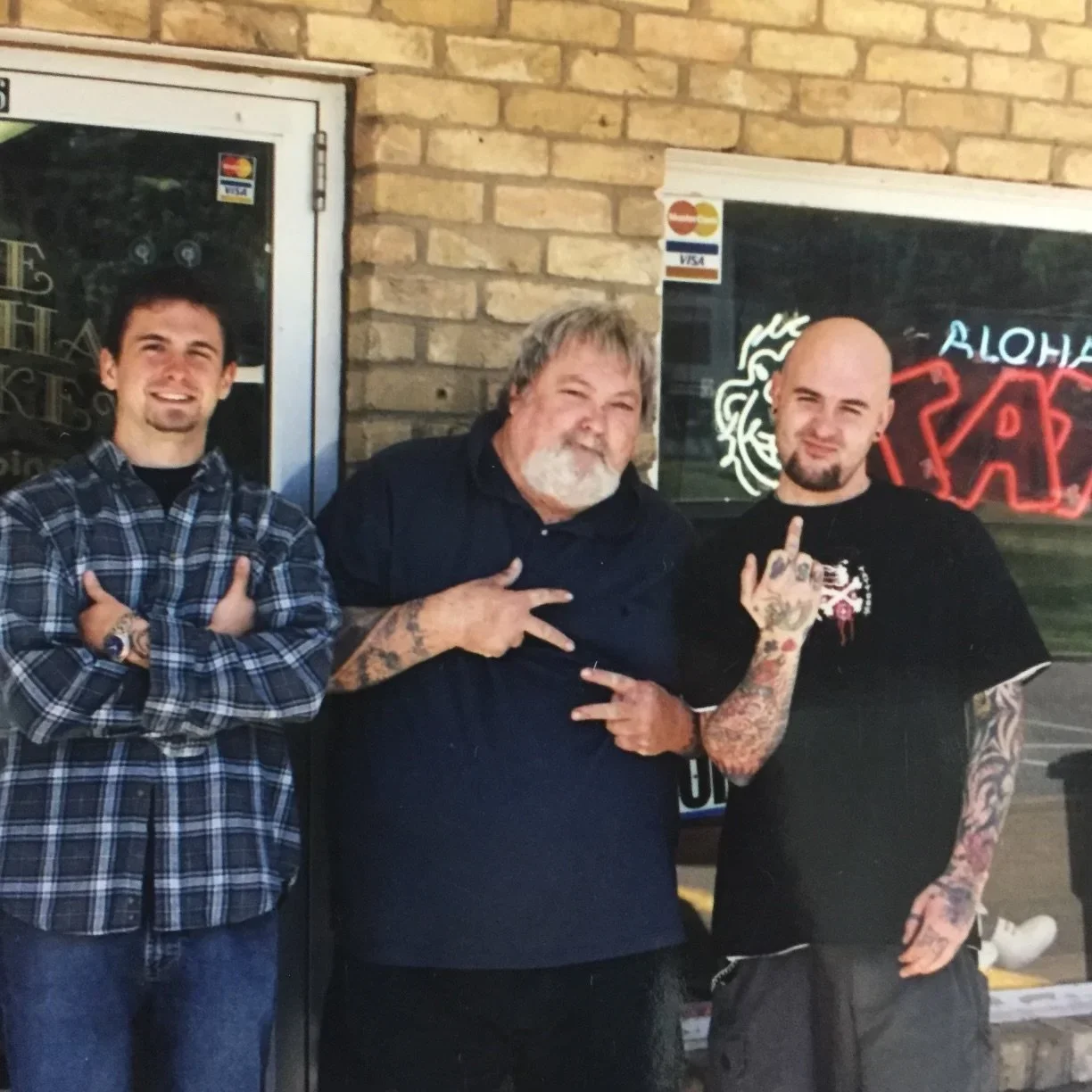 Josh Arment, Mike "Rollo" Malone, and Keith Underwood outside of Aloha Monkey