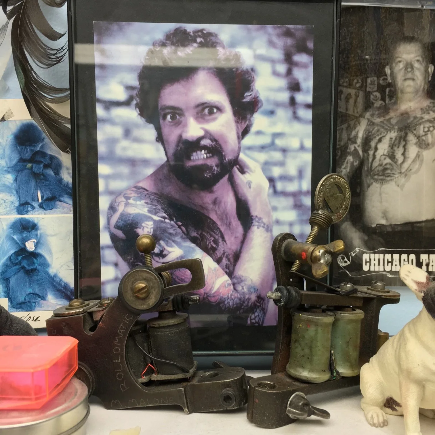 Mike "Rollo" Malone shrine with some of his vintage tattoo machines