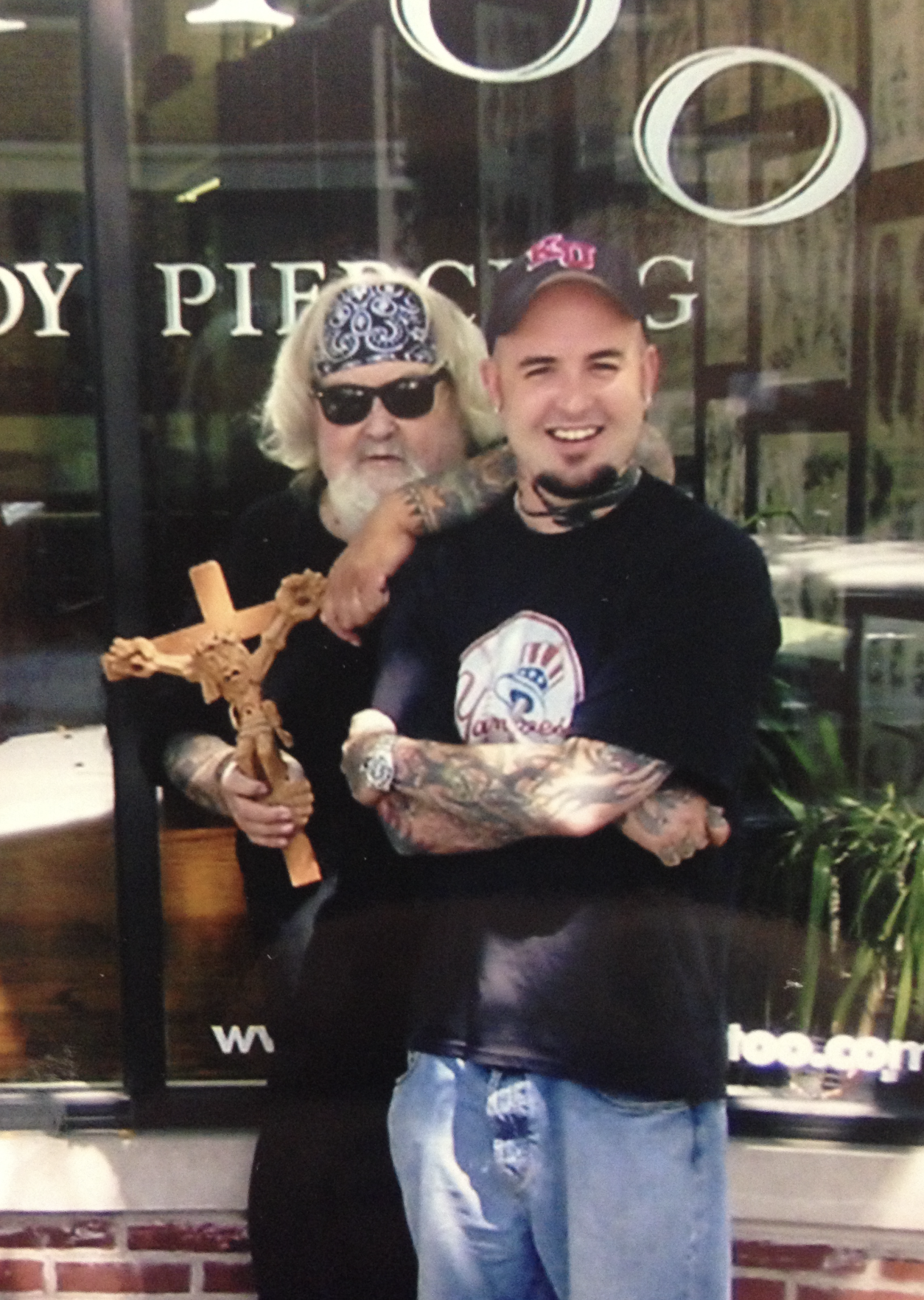 Keith Underwood and Mike "Rollo" Malone outside of Taylor Street Tattoo