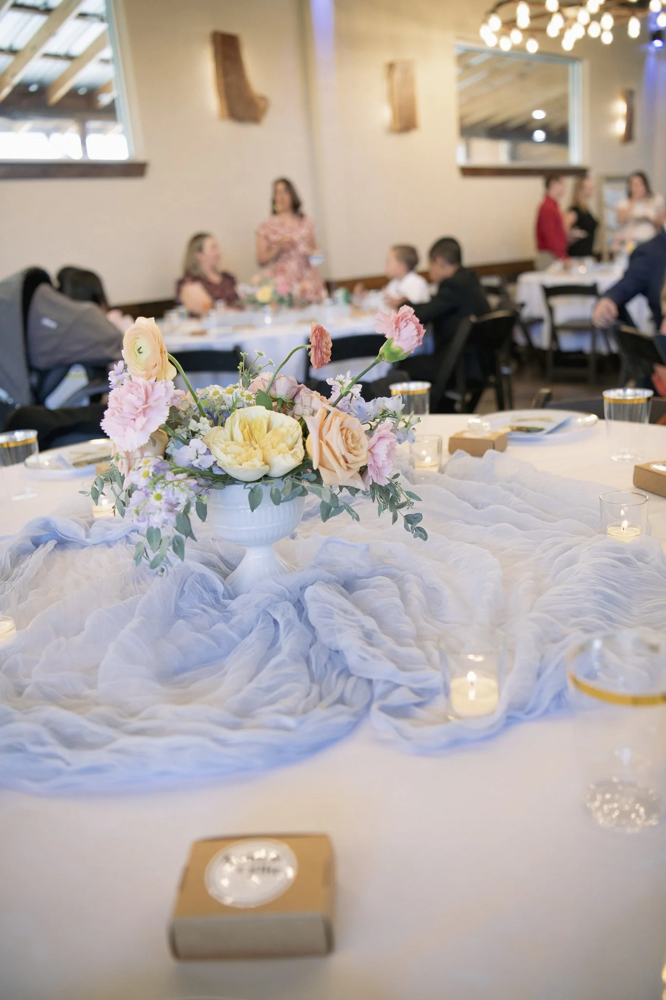 Reception Centerpieces for Andrew and Ellie's Wedding
Photo taken by Thatcher Dorn Photo
