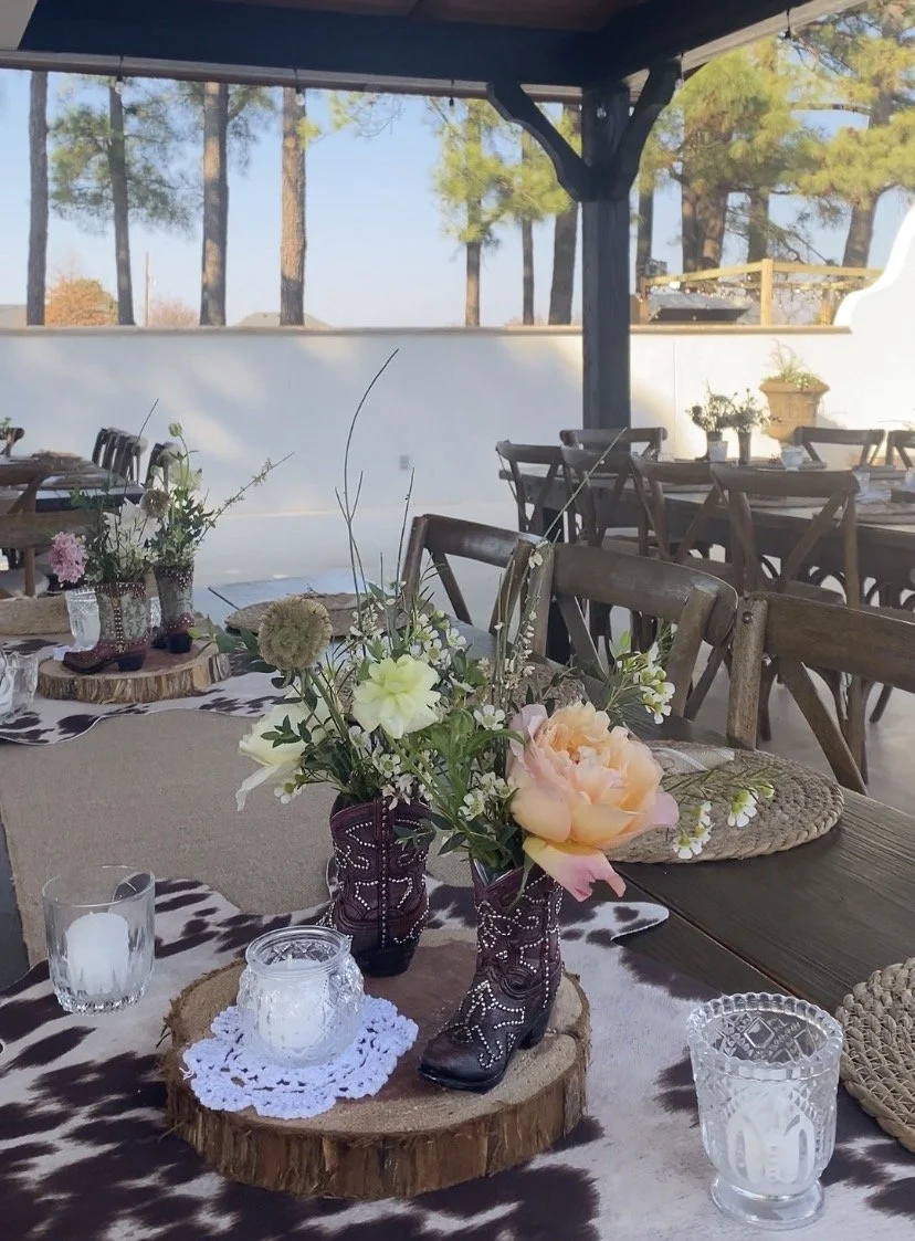boot bud vase centerpieces for a western themed party!
