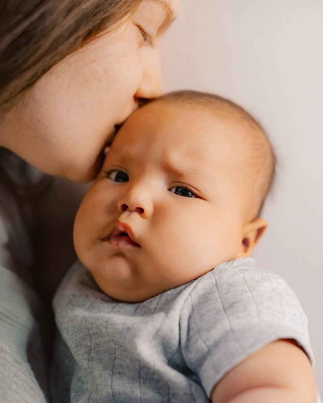 Motherhood moves fast.

That's why I love photographing mothers and their babies. Not just to create beautiful portraits, but to preserve the way this chapter feels right now.

These aren't images that should live on a hard drive. They deserve a plac