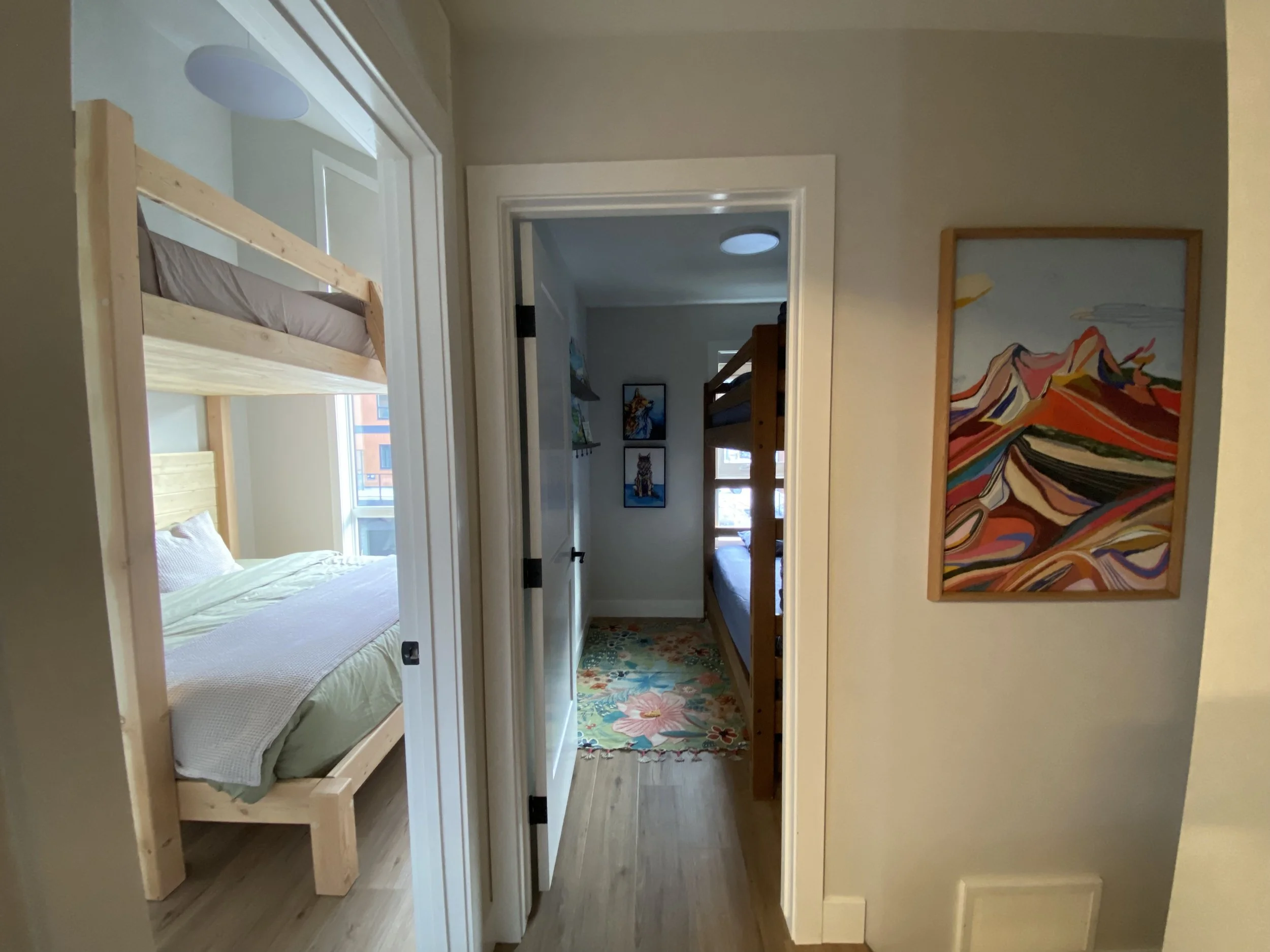 Two additional bedrooms upstairs: Cariboo (left) and Monashee (center). 