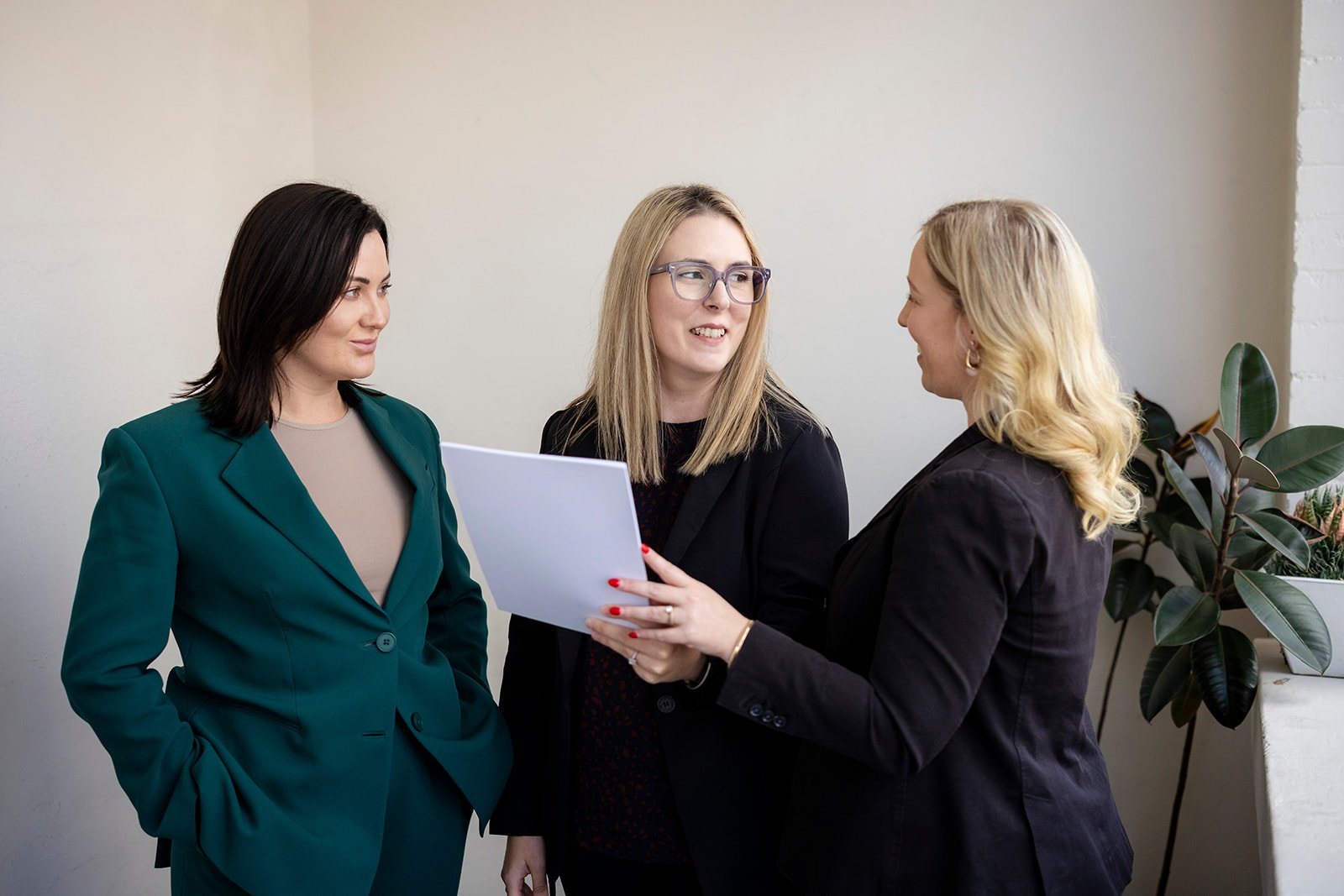 Zoë Rickards, Rebecca Swain and Lucy Gahan discussing a matter