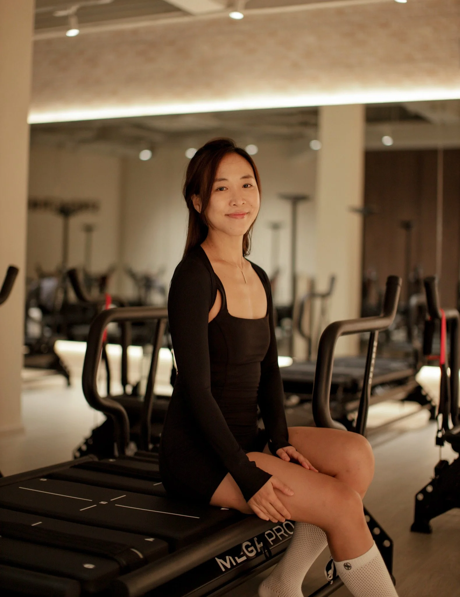 Cathy (Trainer at H-Kore Singapore, Lagree studio)