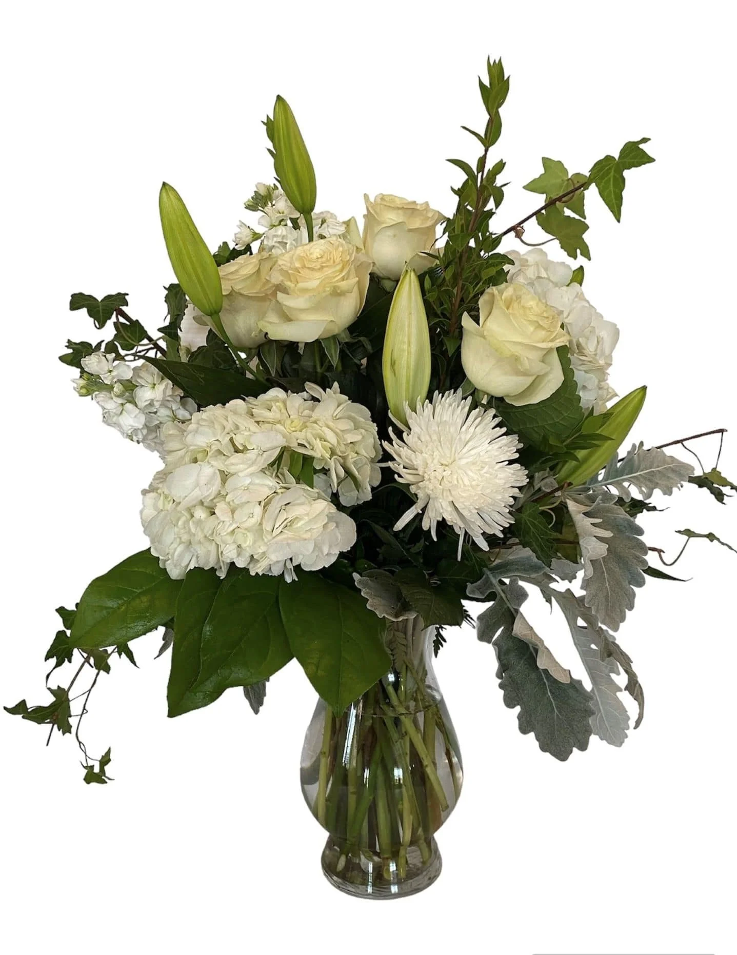 Lush white arrangement in tall vase