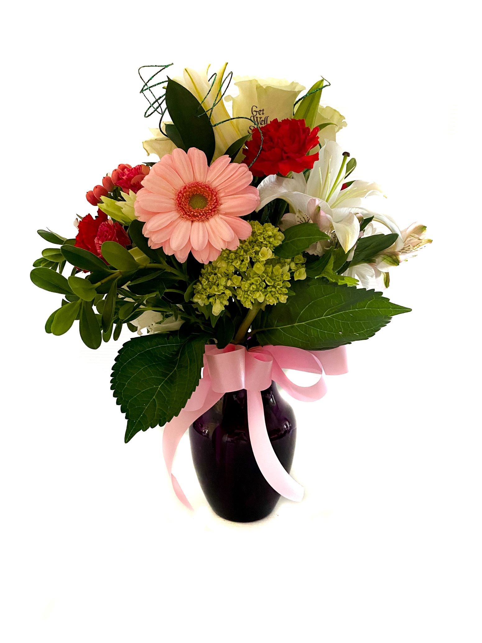 Gerbera Daisies & roses designed in colored vase