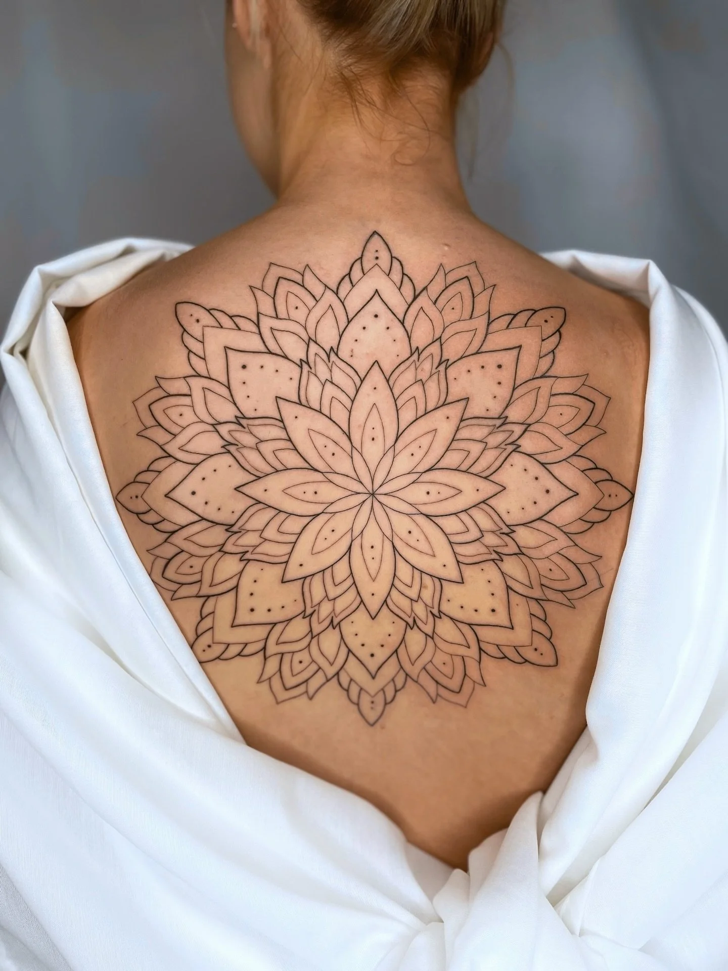✤ Mandala Back piece ✤

Since this photo we&rsquo;ve added shading for depth! 🤍 

To schedule an appointment or request a consultation, please DM me @&zwnj;misskalitattoos xx
