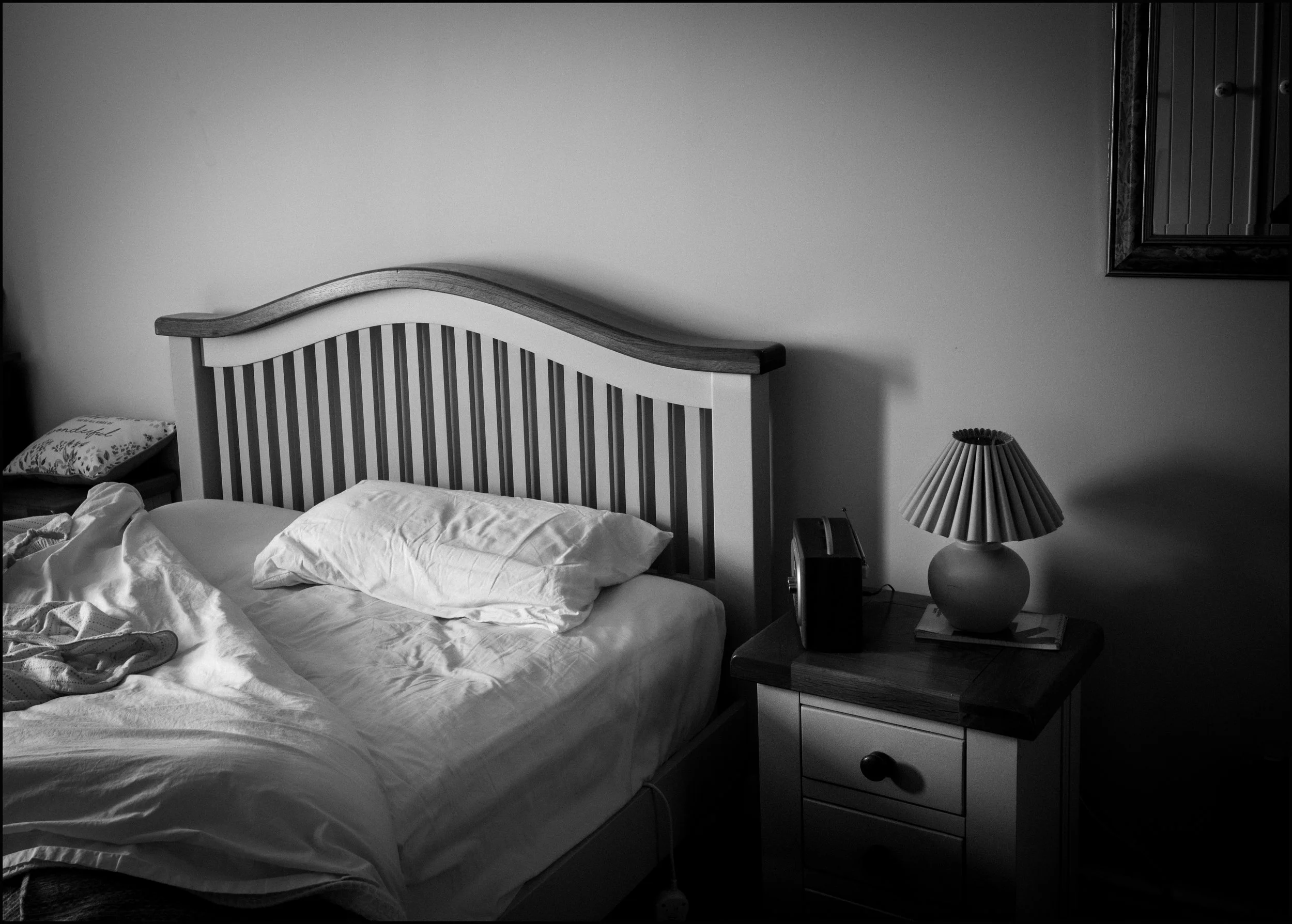 her unmade bed